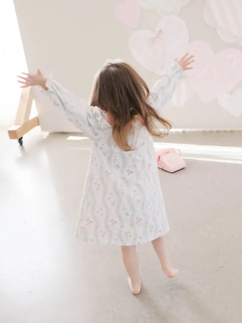 Toddler girl wearing long sleeve floral dress