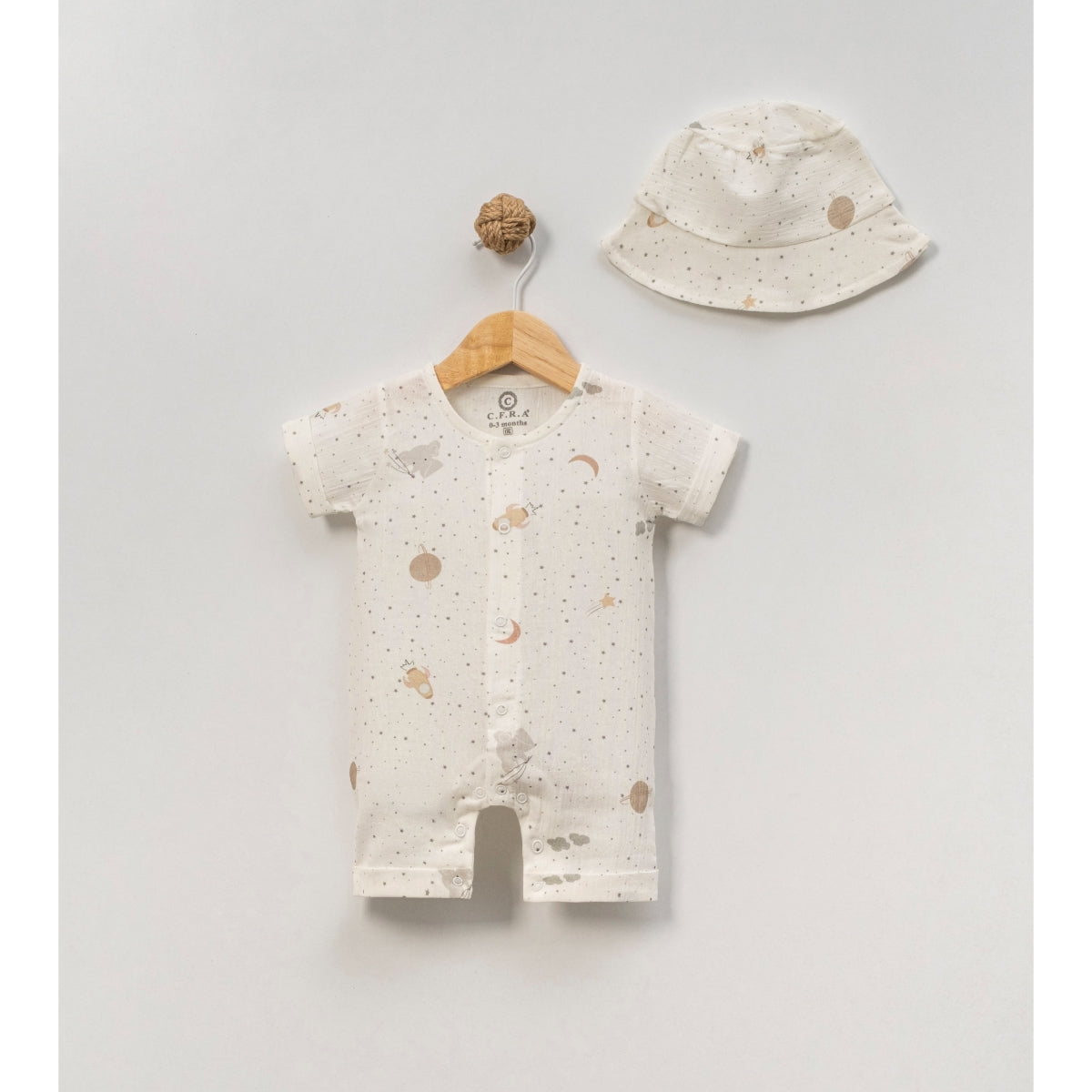 Space print baby romper with matching bucket hat