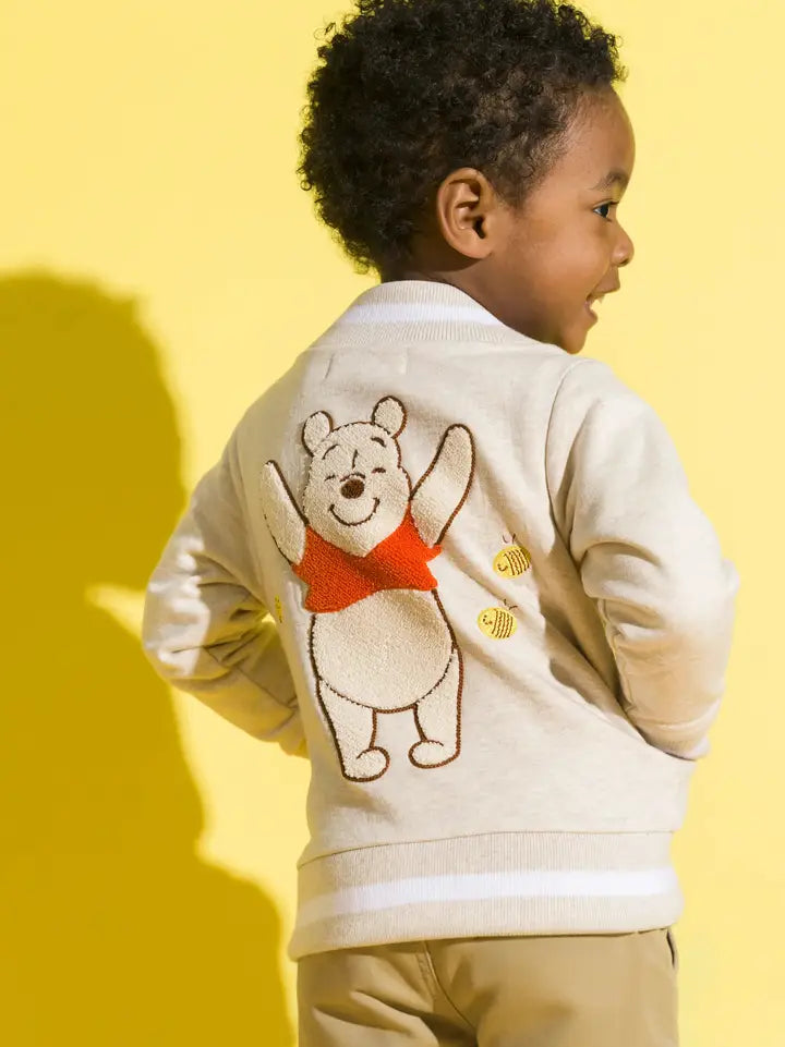 Organic cotton baby Winnie the Pooh bomber jacket with embroidered Pooh bear and bees.