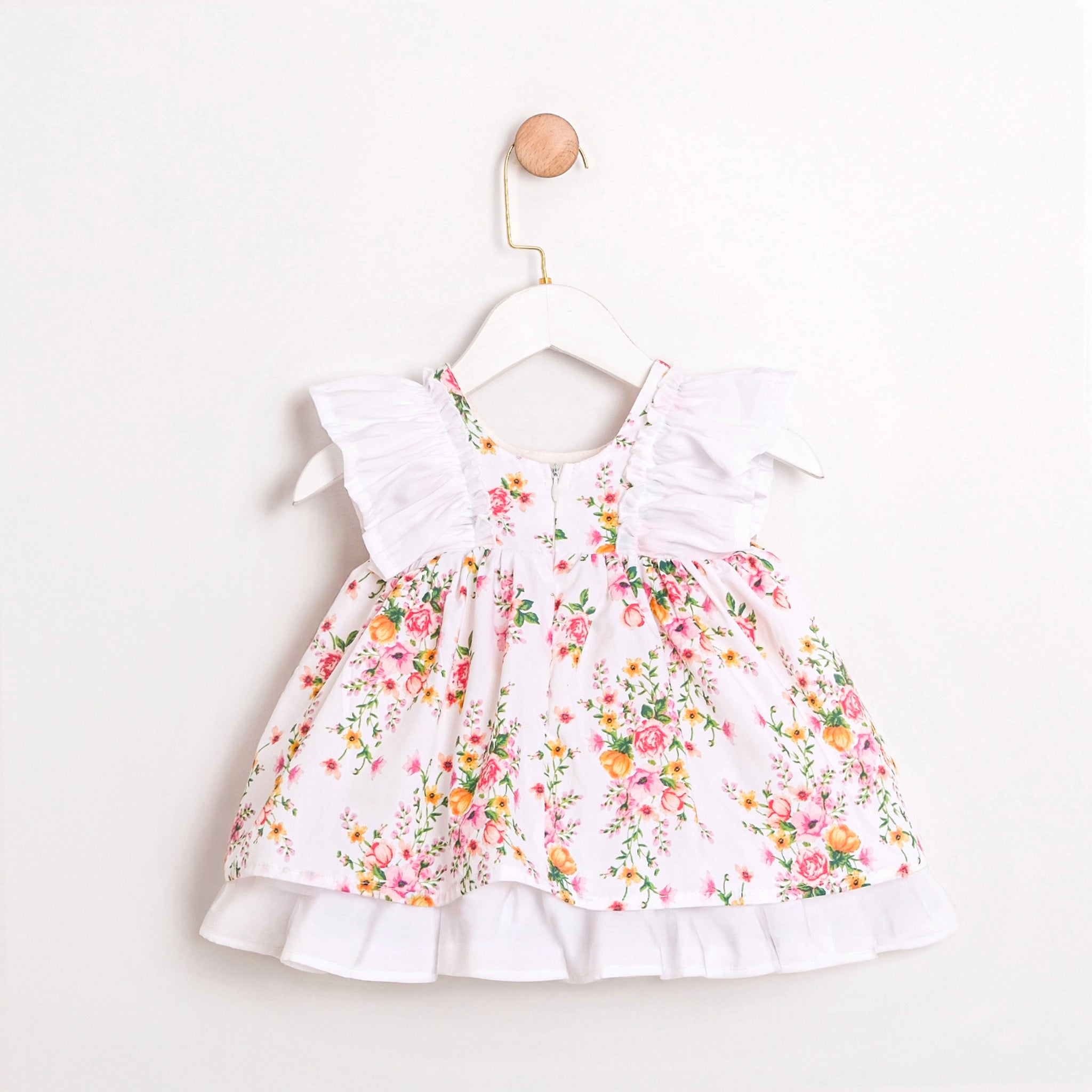 Boutique baby girl dress with floral print and layered skirt