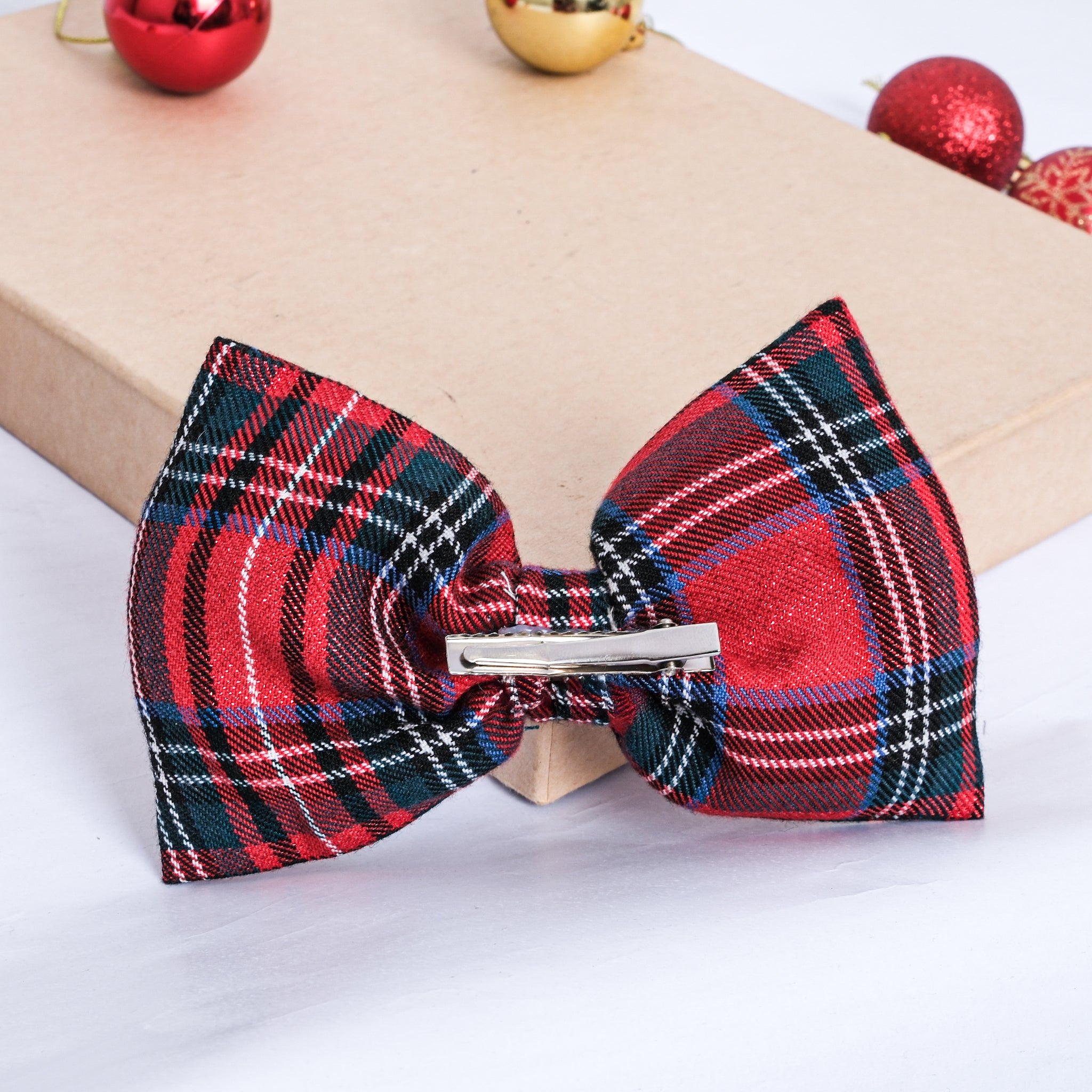 Classic red and green tartan hair bow accessory for girls.