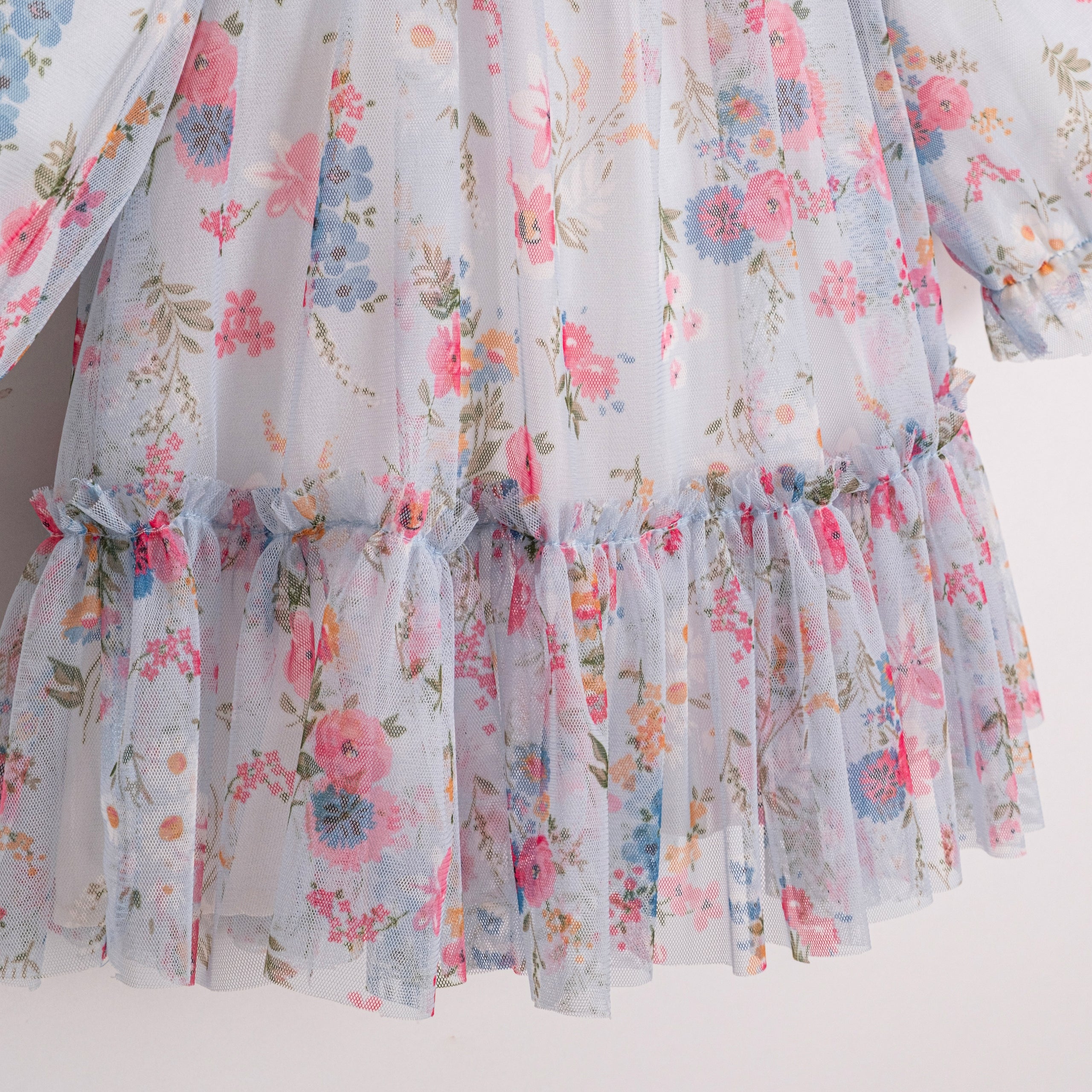 Soft floral baby dress with ruffle skirt detail