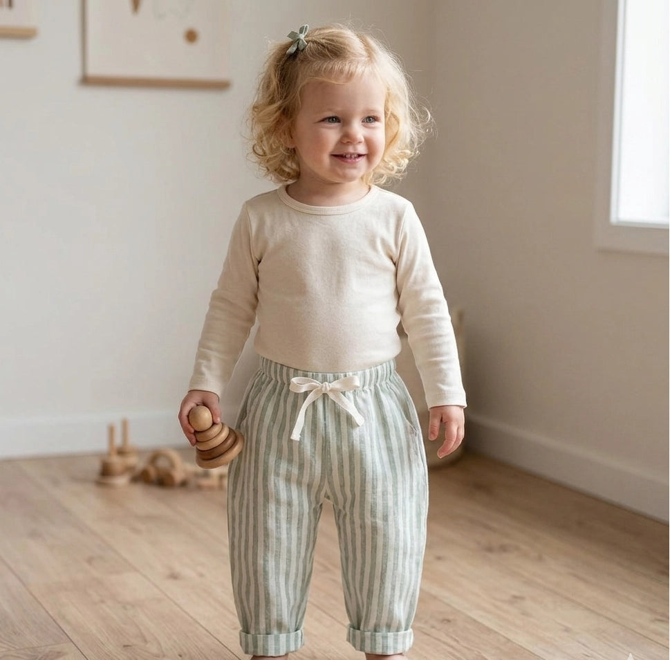 Lightweight organic linen children's pants with elastic waistband.