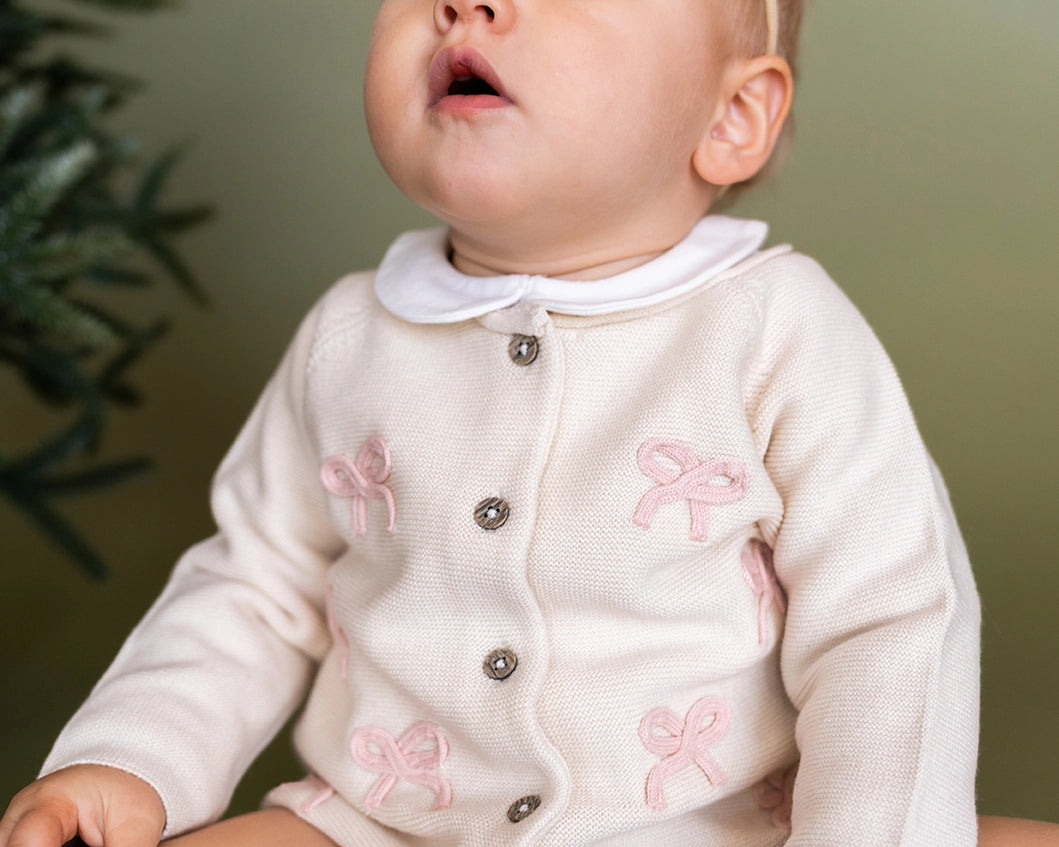 Lightweight organic baby cardigan perfect for newborns and infants.