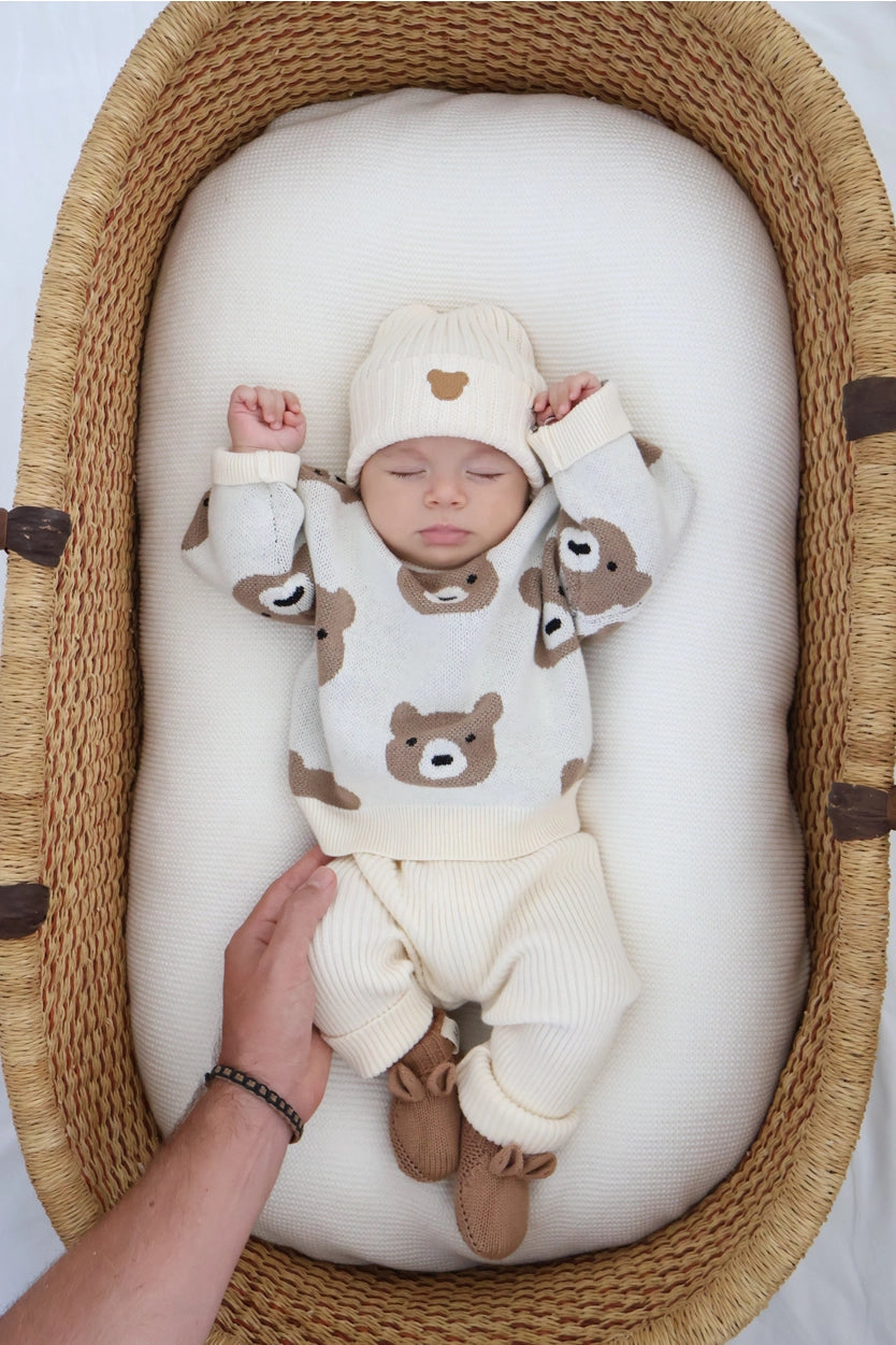 Soft organic knit baby sweater with an adorable teddy bear pattern