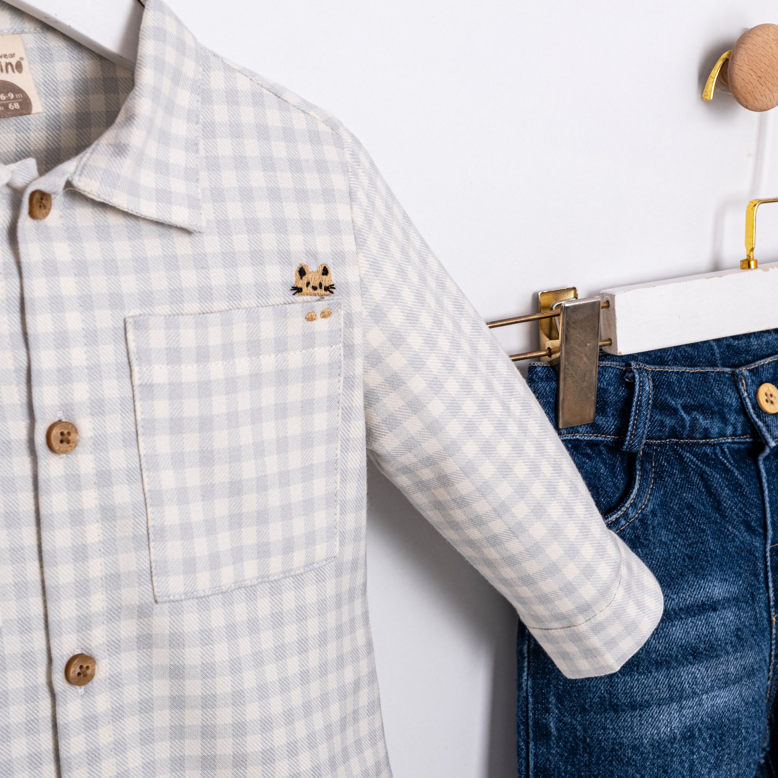 Baby boy outfit with checkered shirt and jeans