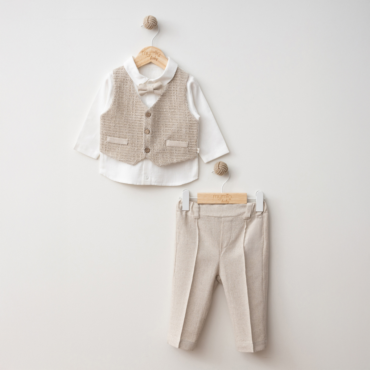 Elegant 3-piece baby boy set with white shirt, vest, and linen trousers