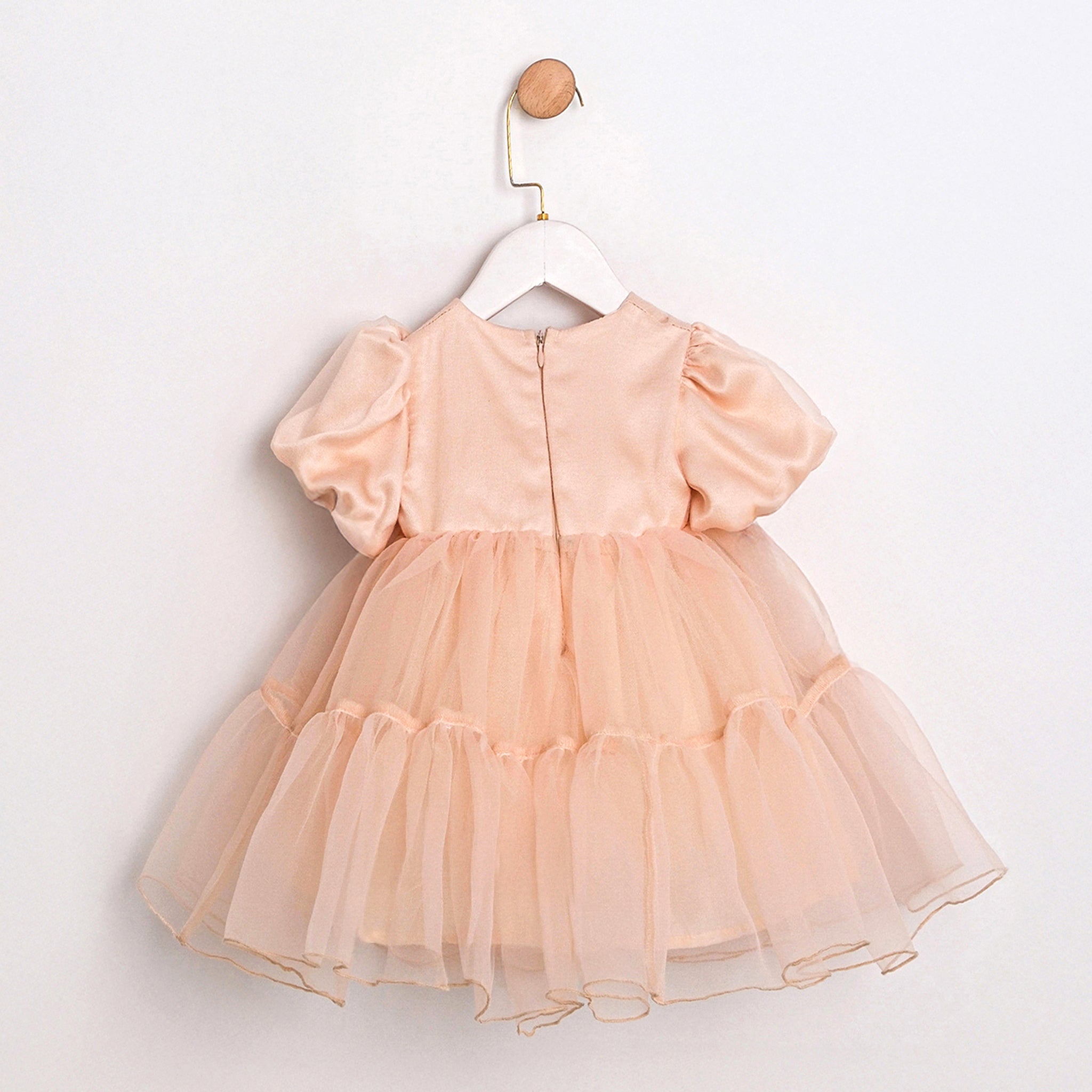 Blush pink baby dress with flower detail and tulle