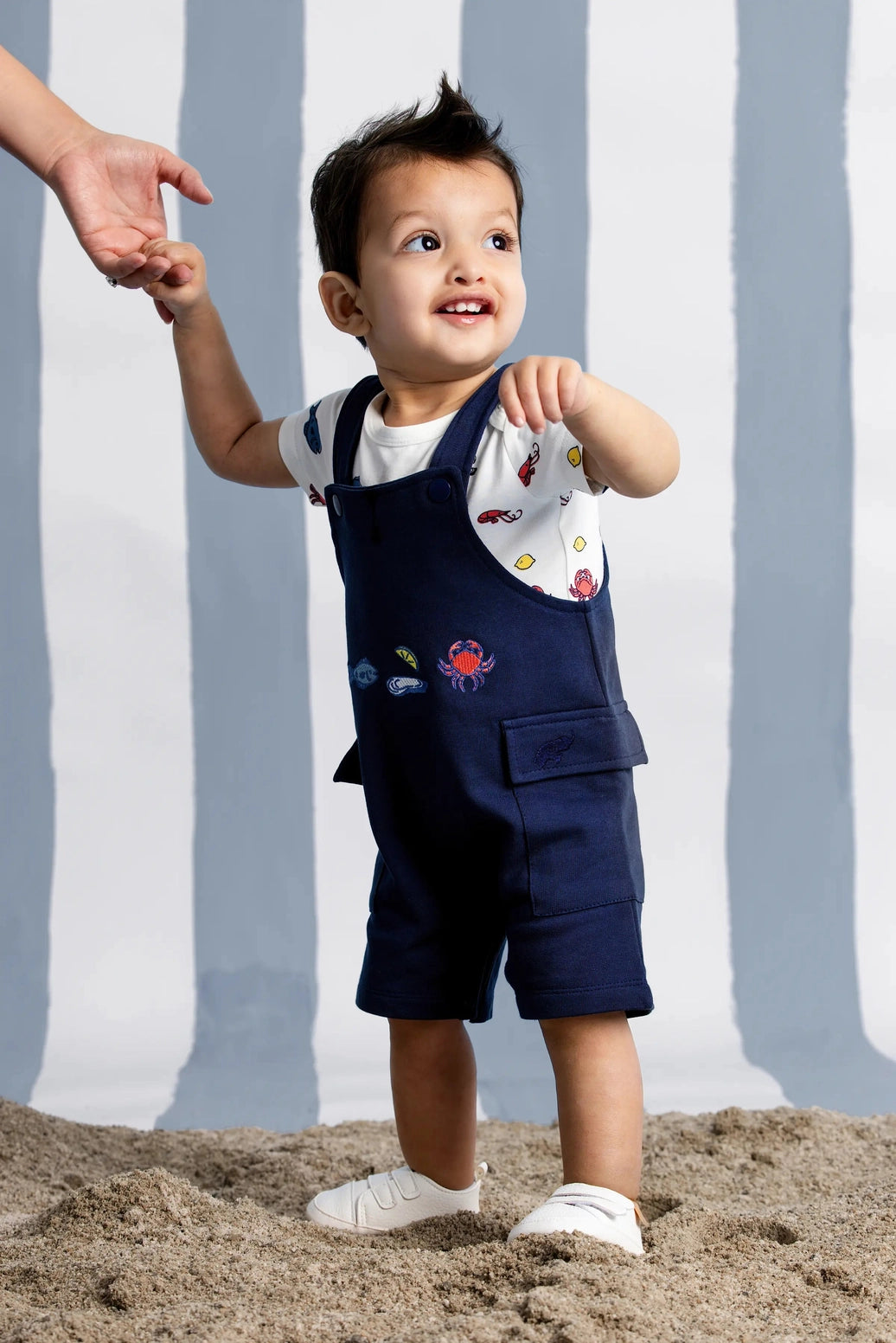 navy baby shortall with ocean print bodysuit