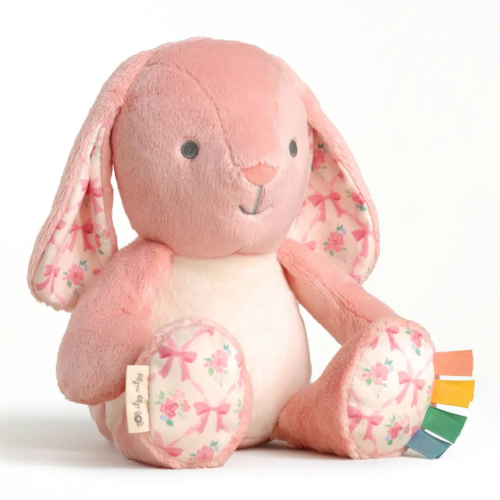 Pink bunny sensory plush toy with floral ears