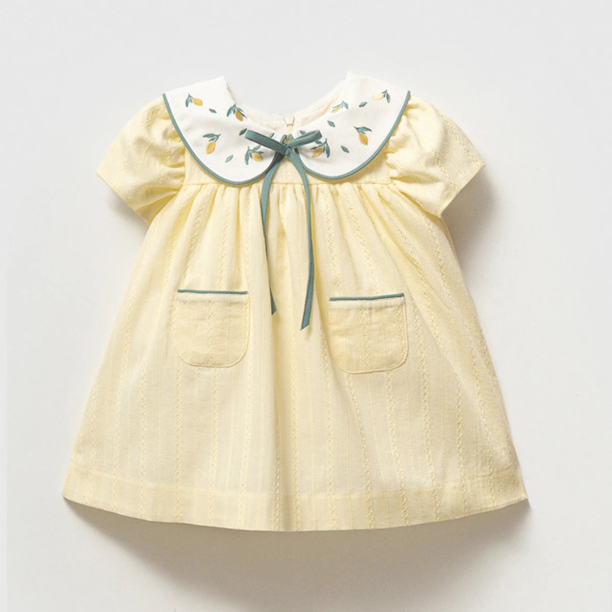 Soft cotton baby dress with Peter Pan collar and pockets