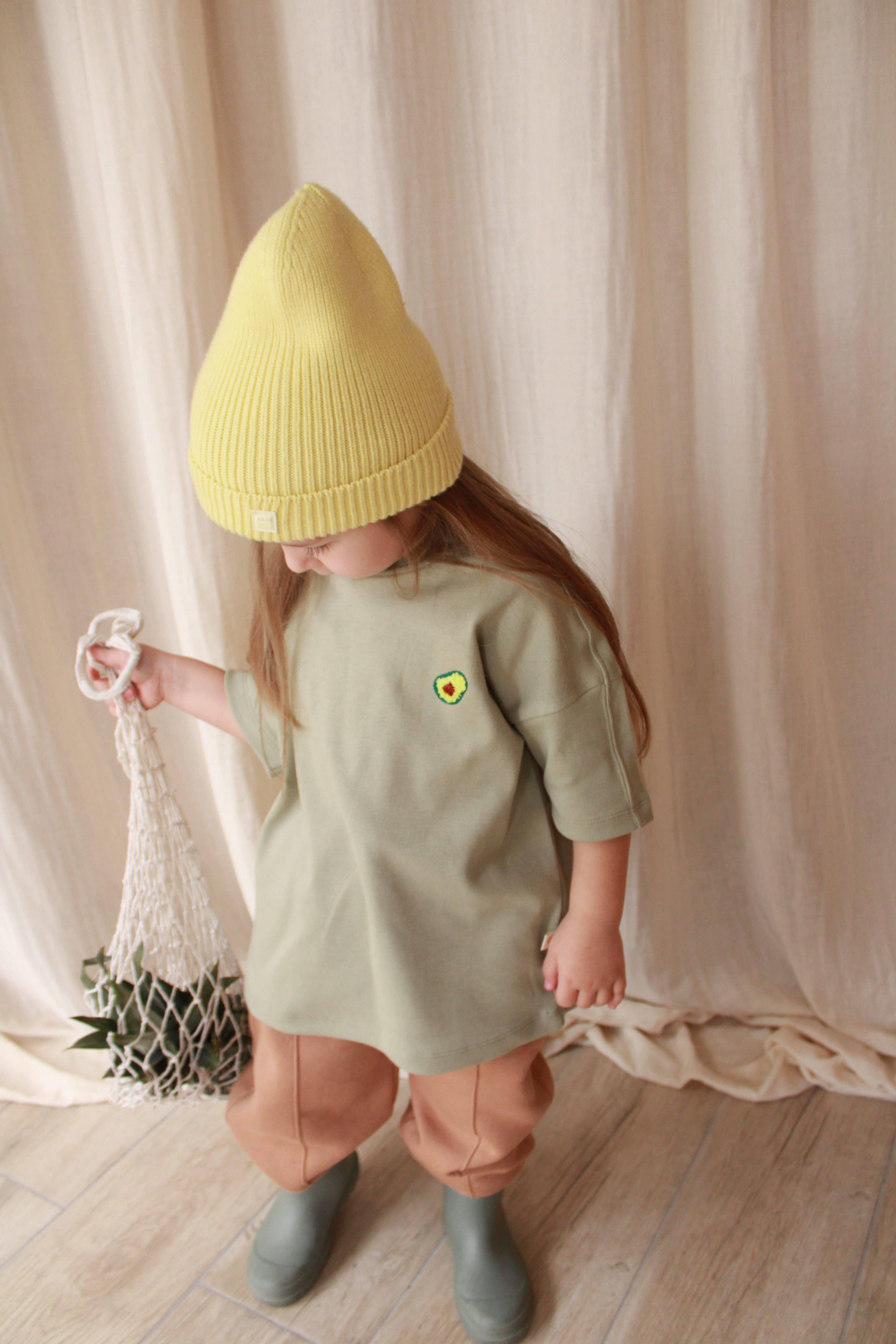 Cute oversize avocado graphic t-shirt for babies and kids, breathable cotton everyday top.