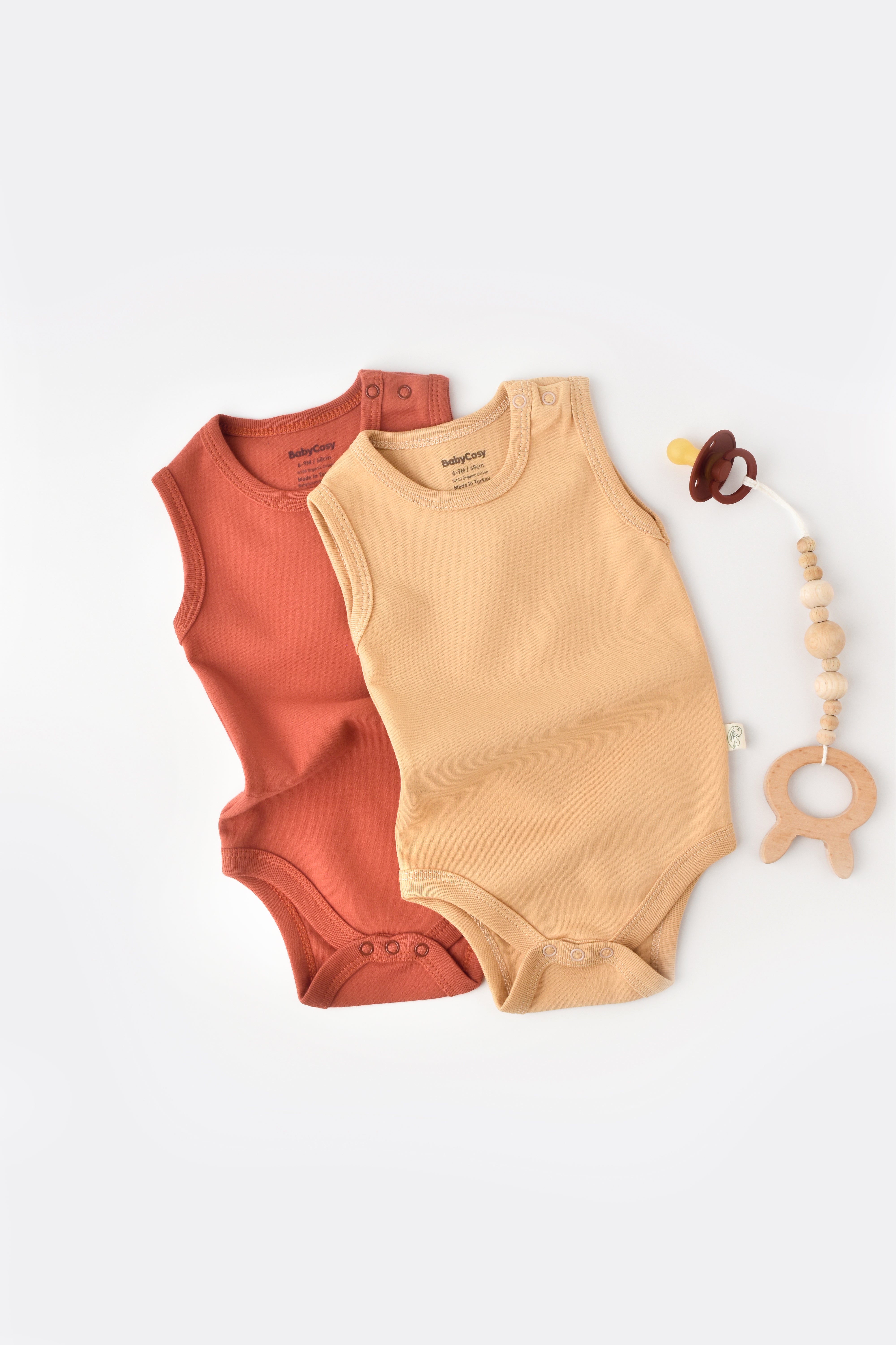 Two pack sleeveless baby bodysuits made from 100% organic cotton, soft and breathable infant essentials