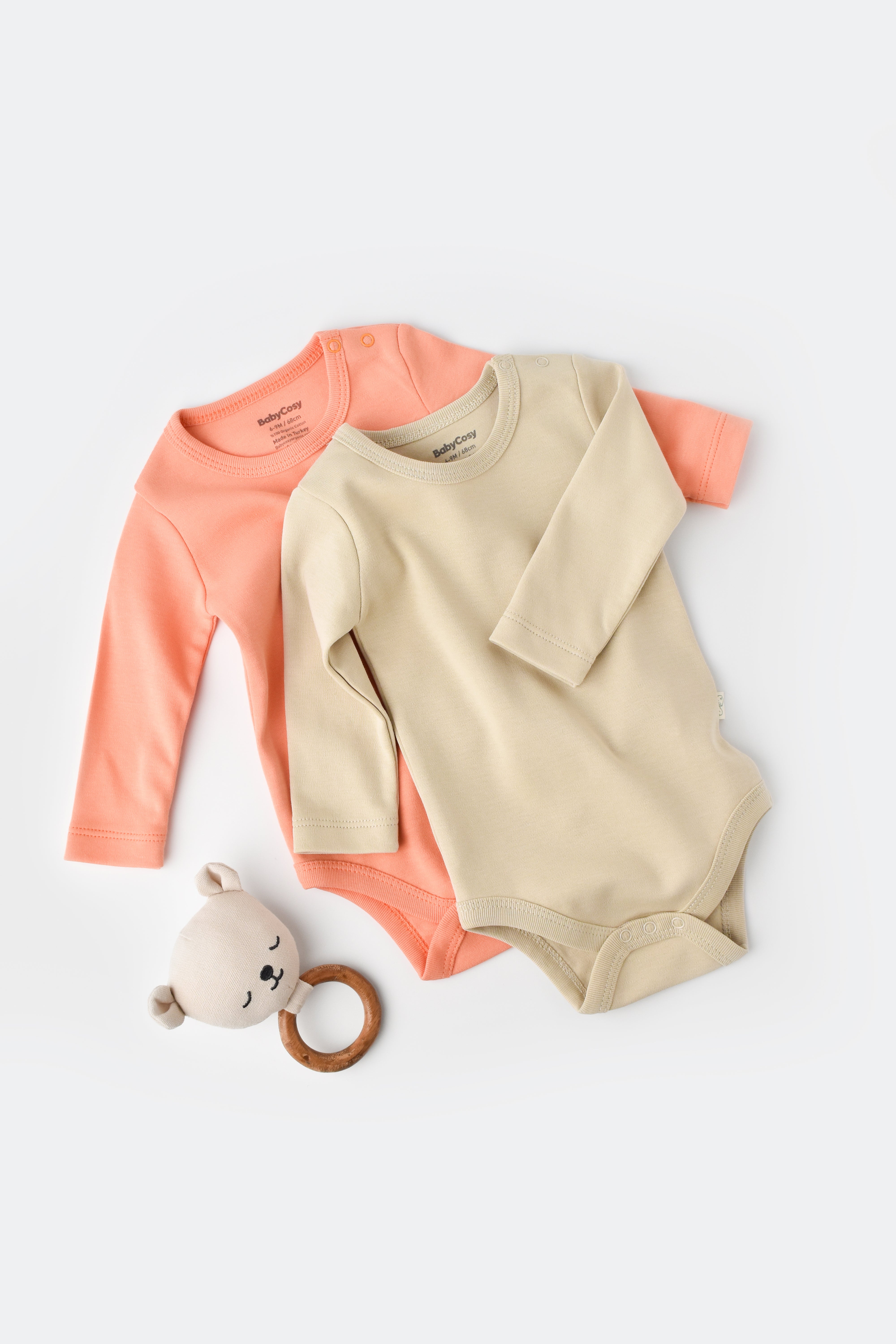 Two pack long sleeve baby bodysuits made from 100% organic cotton, cozy infant essentials