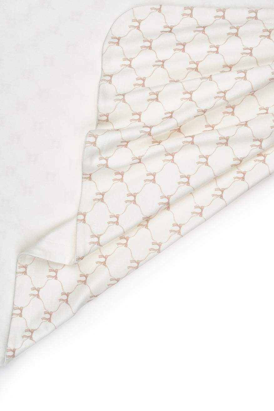 Soft newborn blanket with ruffle trim and blush bow