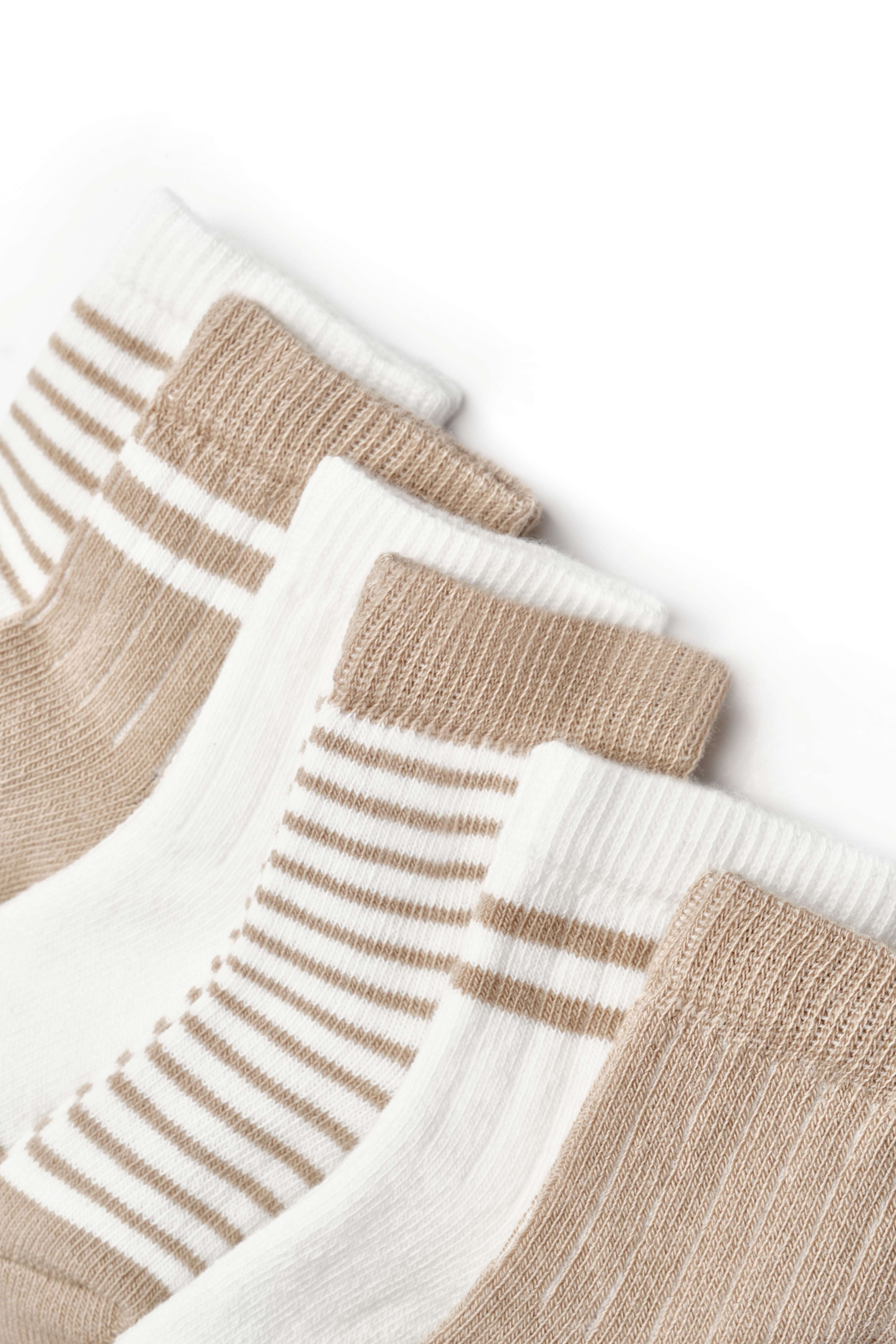 Beige and white baby sock bundle with ribbed cuffs