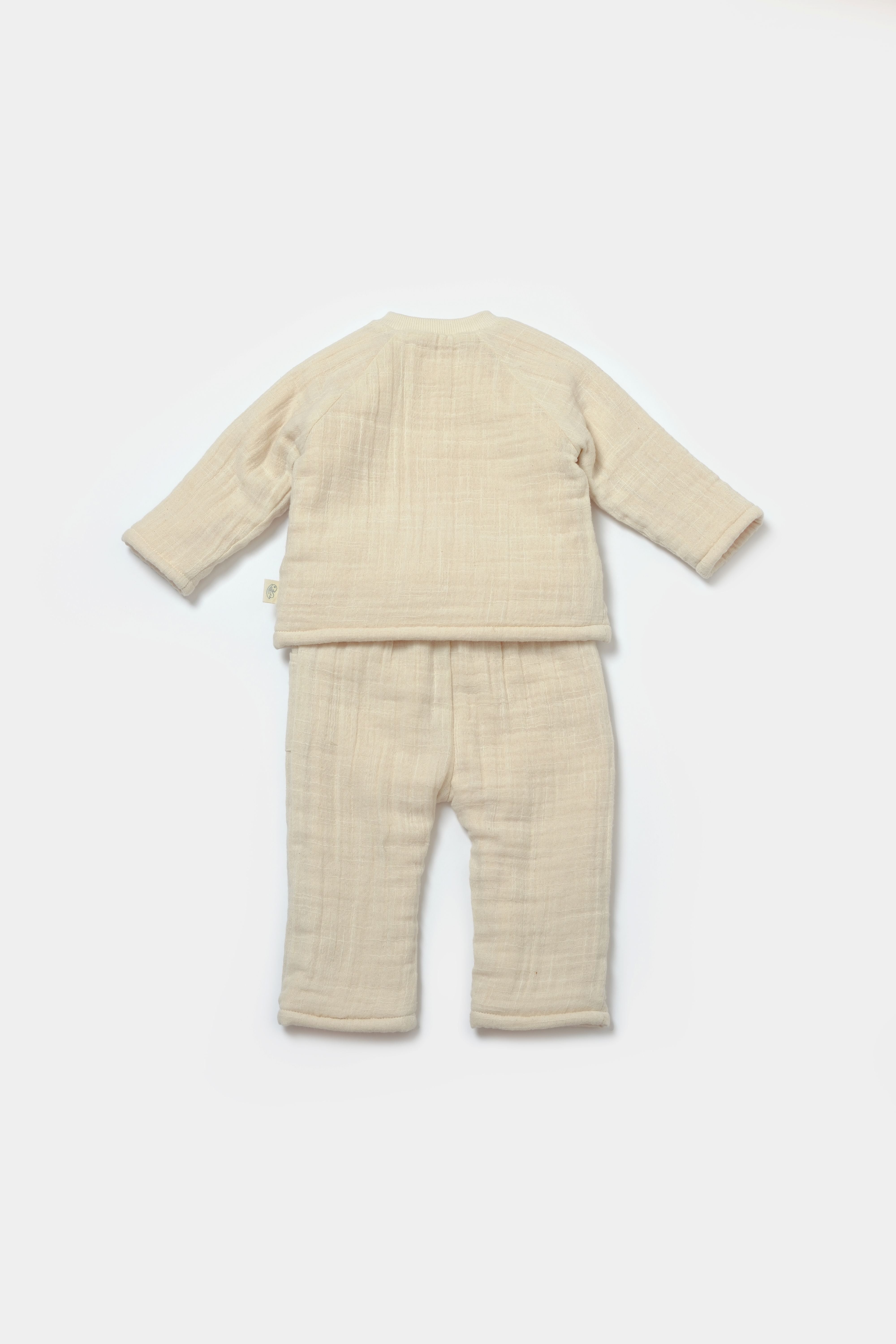 Breathable muslin baby top and pants set in neutral cream