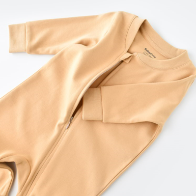 Unisex mustard organic cotton onesie, cozy eco-friendly baby clothing for infants and toddlers.