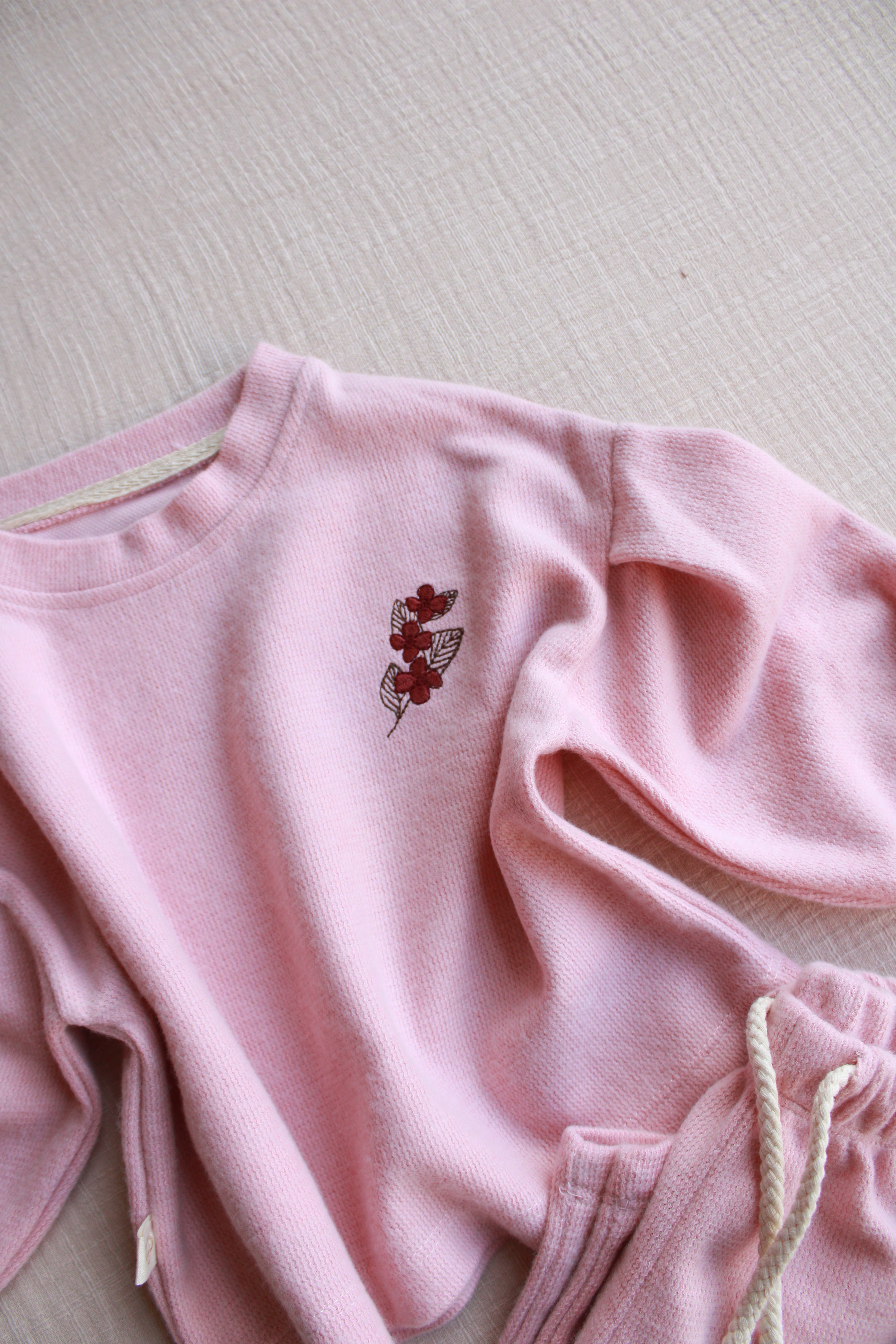 Cozy cotton baby outfit with embroidered floral detail for everyday wear
