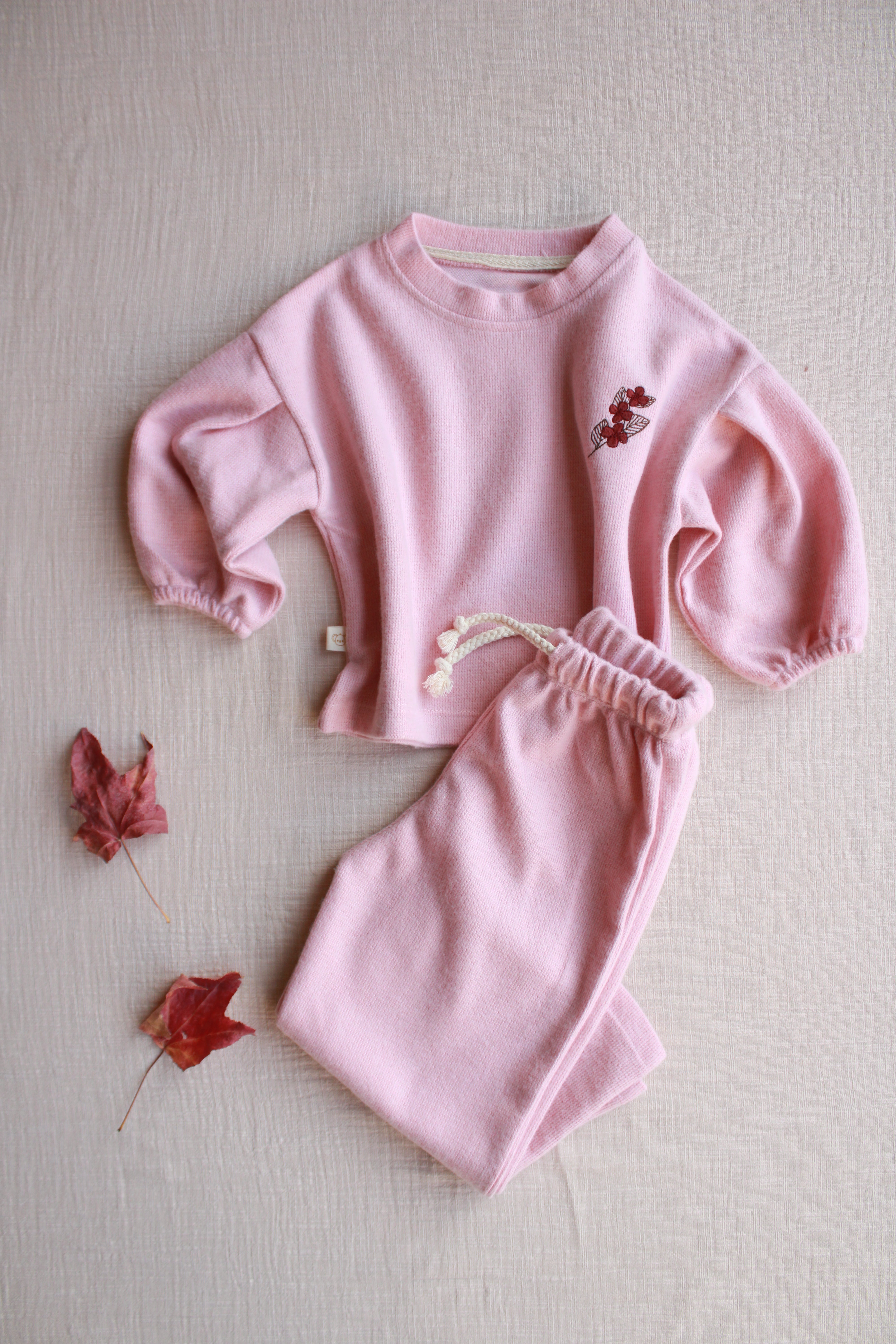 Baby girl blush pink lounge set with floral embroidery and soft cotton fabric