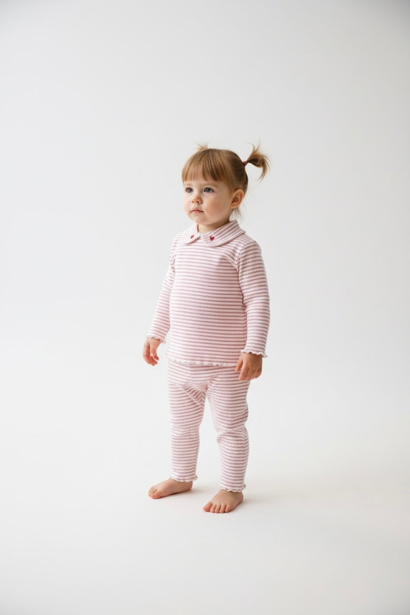 Adorable baby girl striped outfit with heart collar and flared hem.