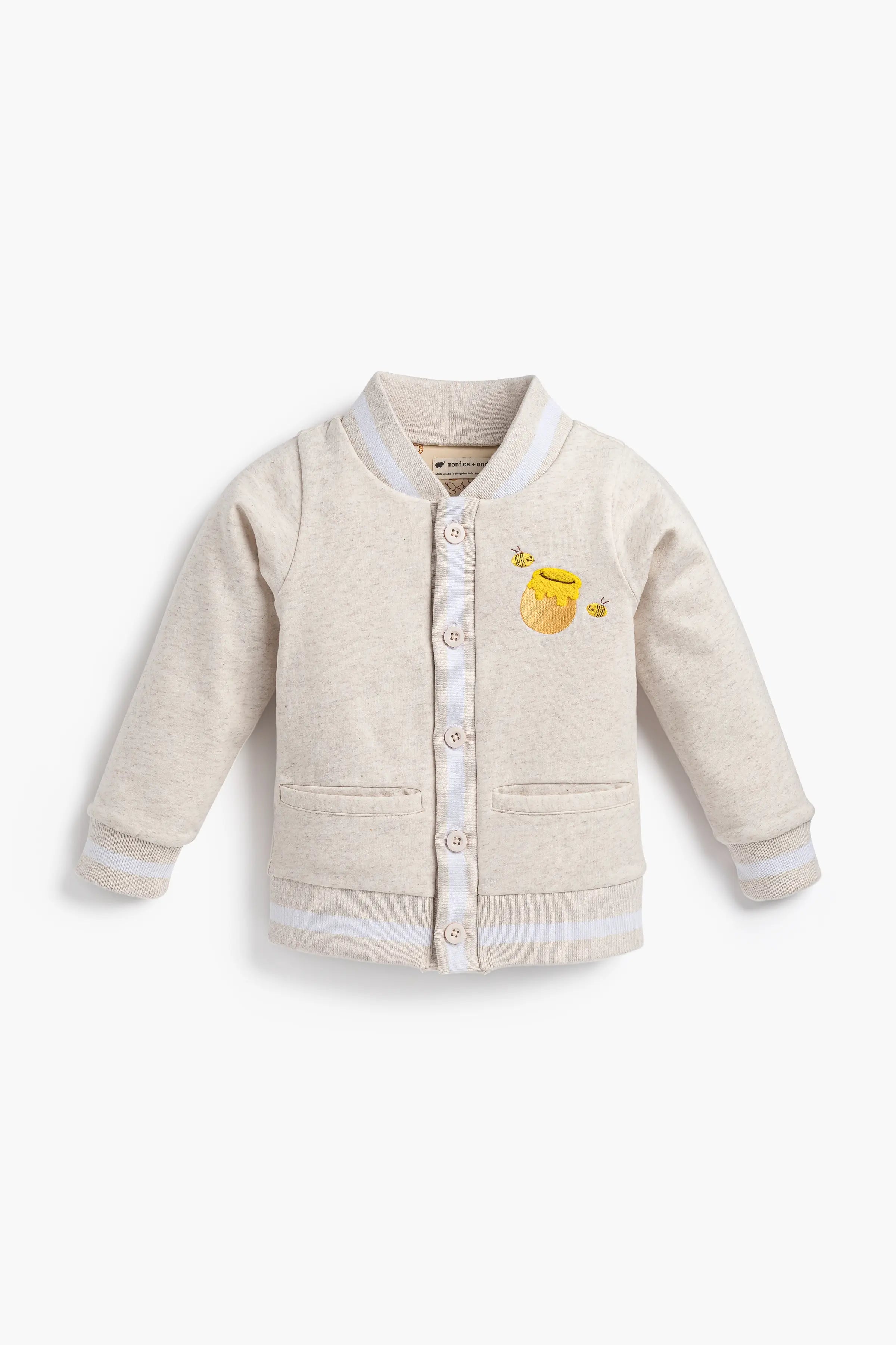 Cozy toddler bomber jacket featuring embroidered Winnie the Pooh on the back and honey pot detail.