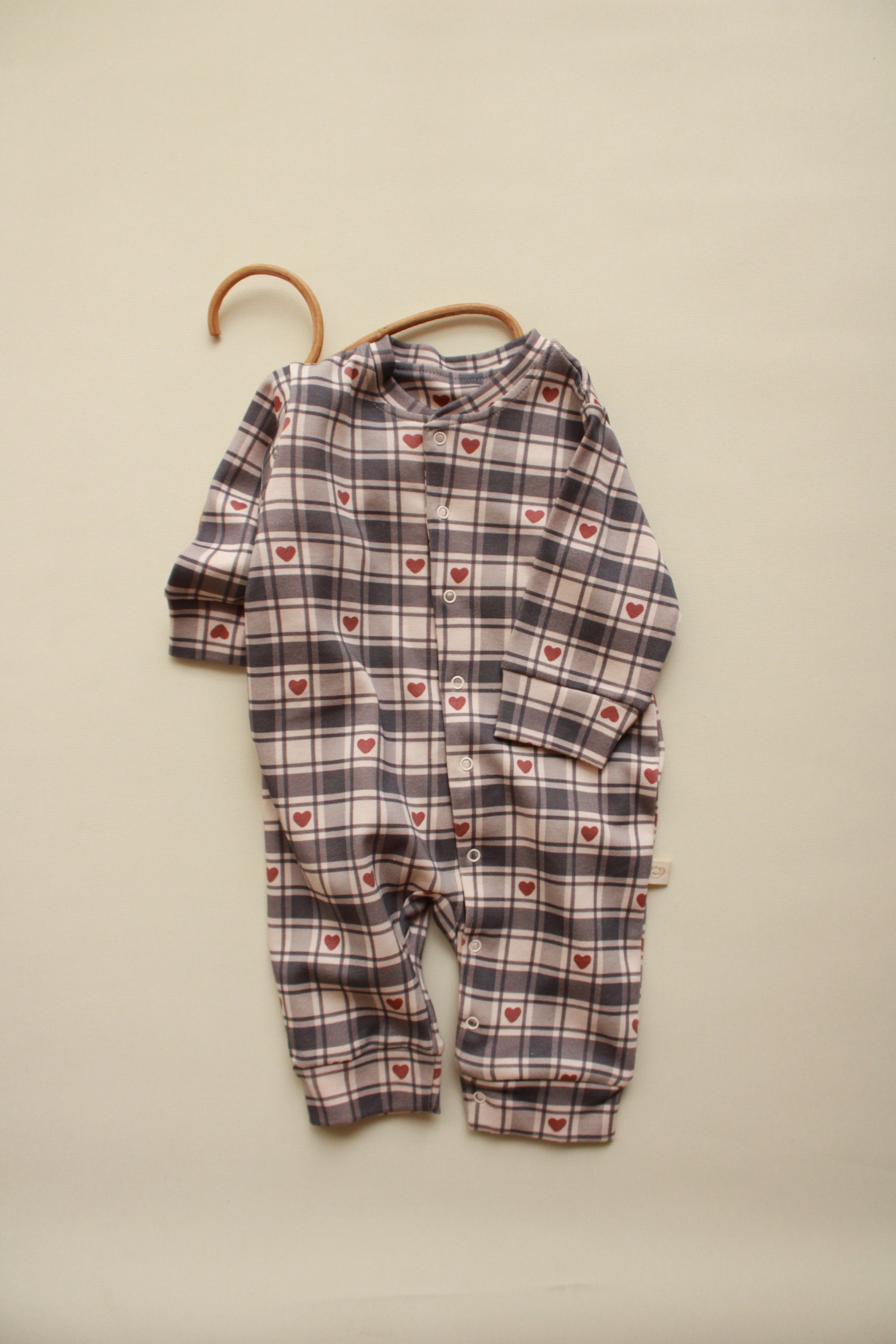 Long sleeve heart plaid baby jumpsuit with snap closure