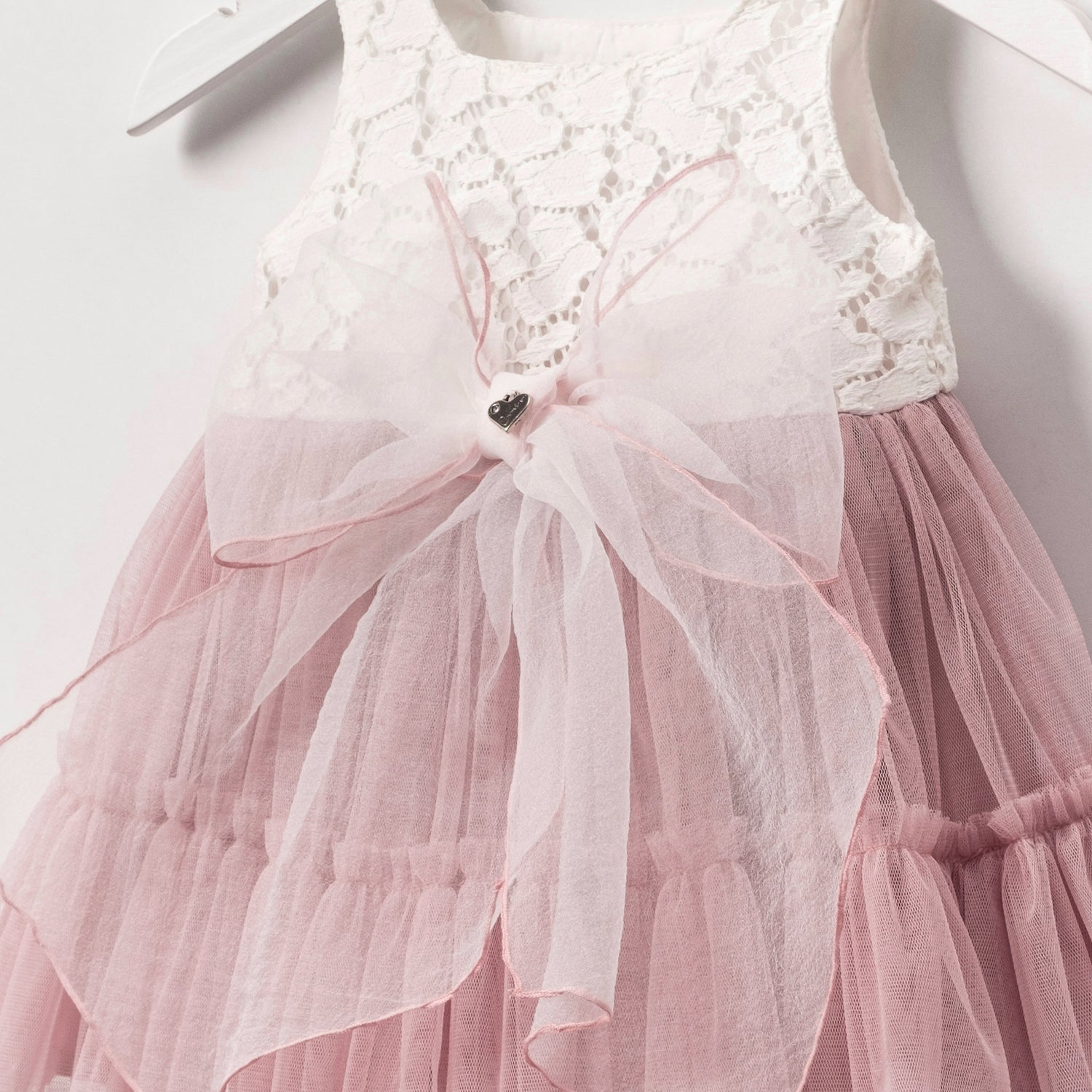 Blush pink lace and tulle dress for babies, stylish special occasion outfit for infants.