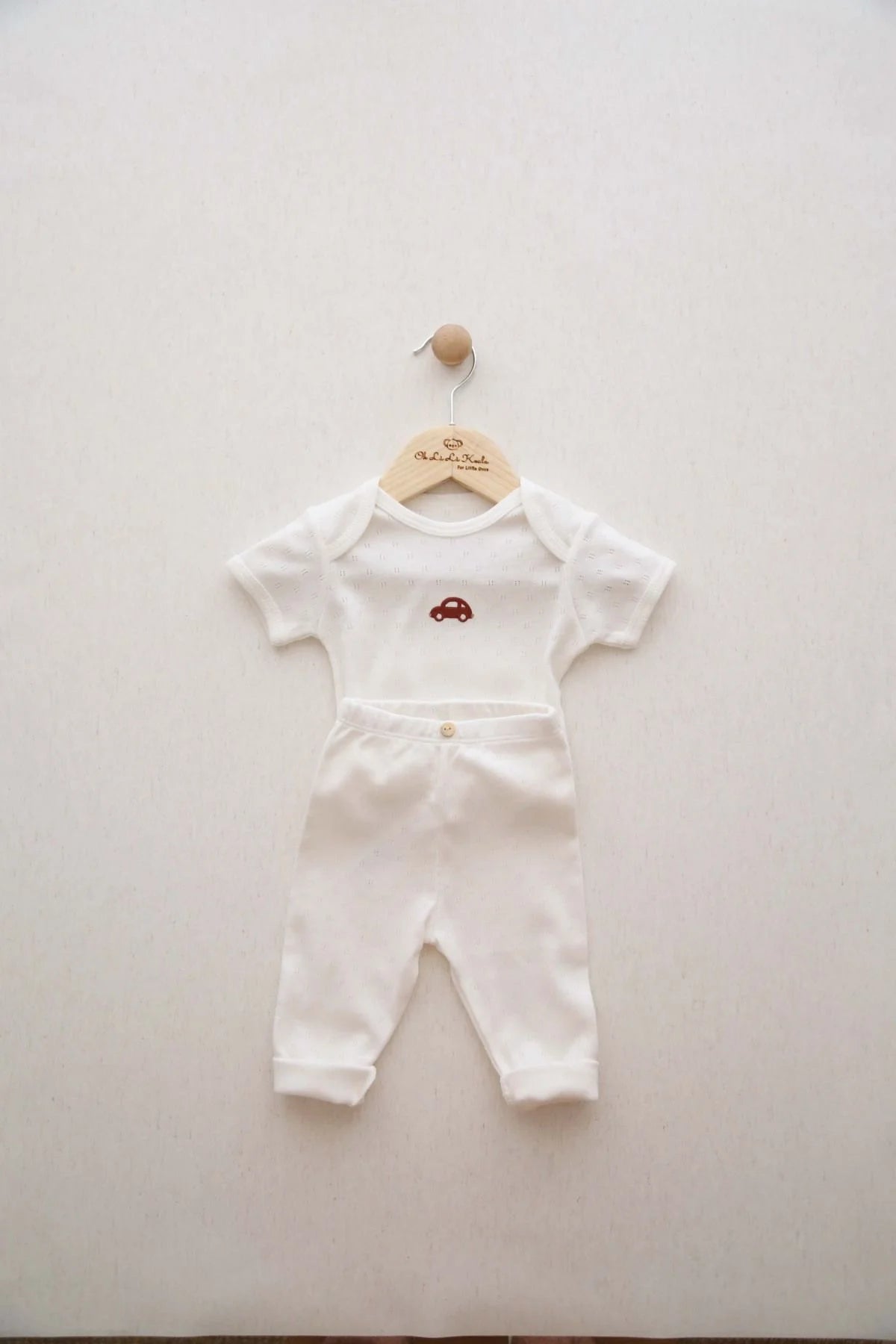 Car patterned 2 piece baby set, soft cotton outfit designed for everyday wear by infants and toddlers.