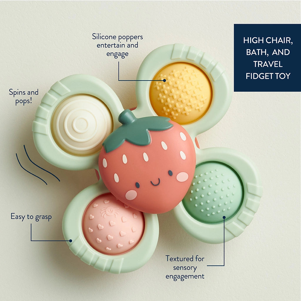 Strawberry baby sensory toy with silicone poppers and textured surfaces