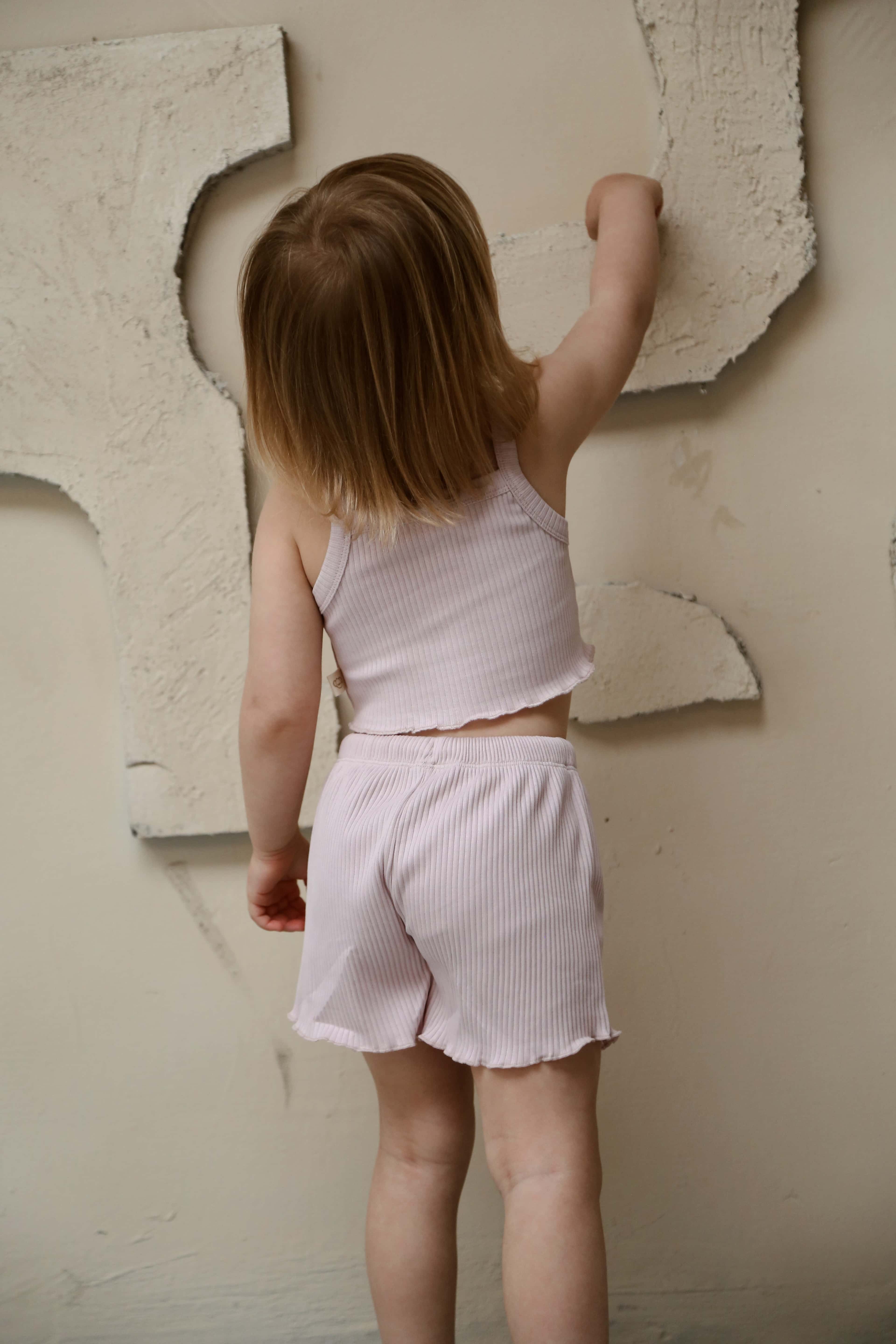 Soft cotton lilac crop-short outfit, fashionable baby girl clothing for everyday comfort.