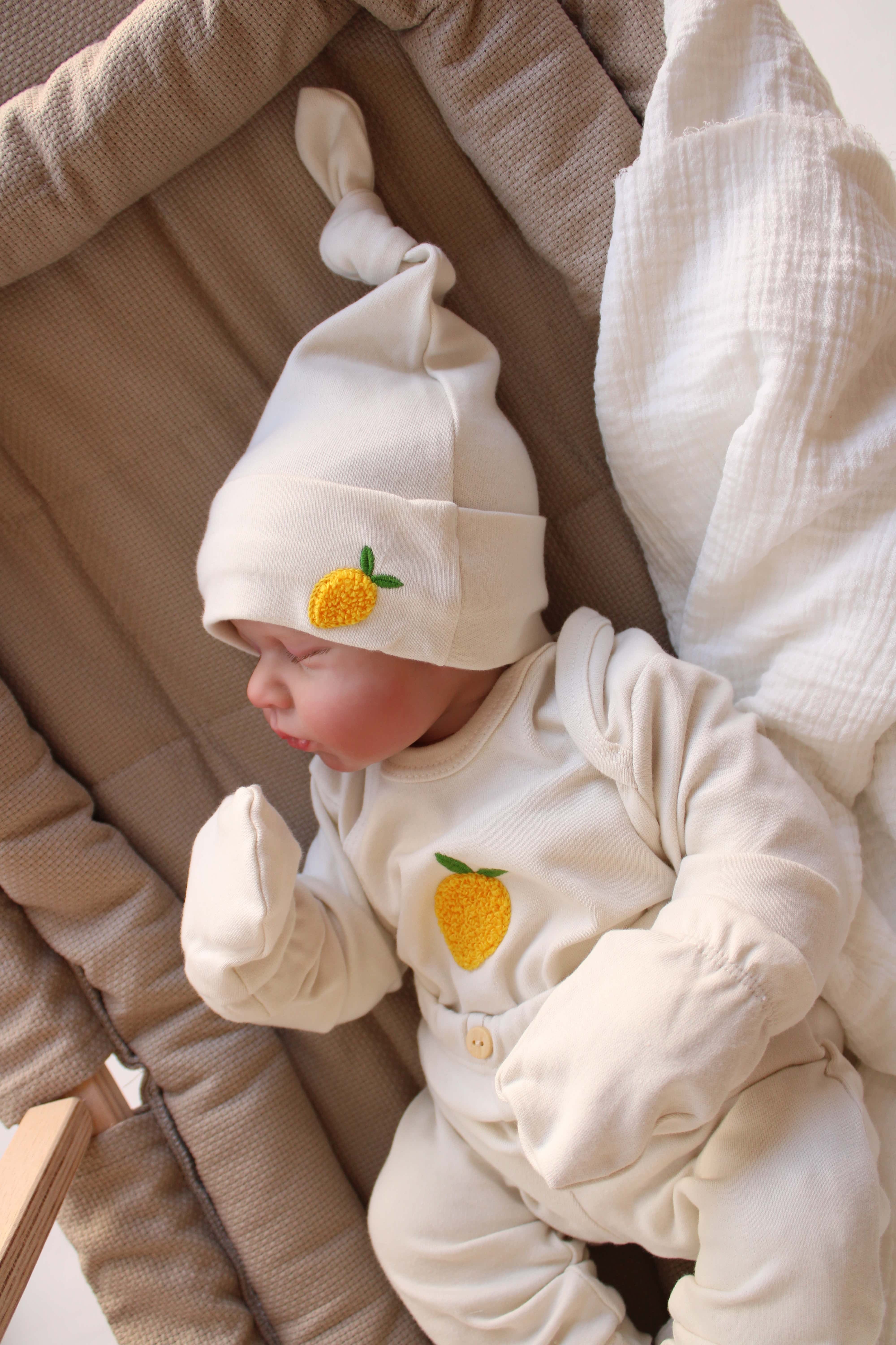 Lemon themed newborn 5 piece clothing set, soft organic cotton baby outfit for comfort.