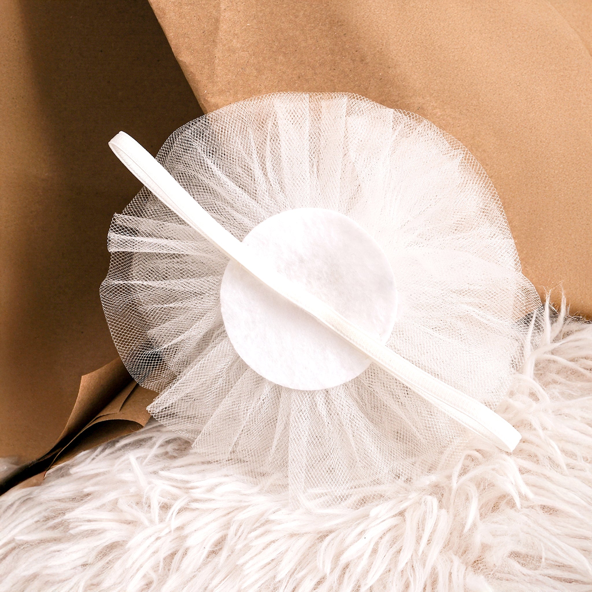 Elegant Pearl Rose white baby romper, timeless newborn outfit for special occasions.