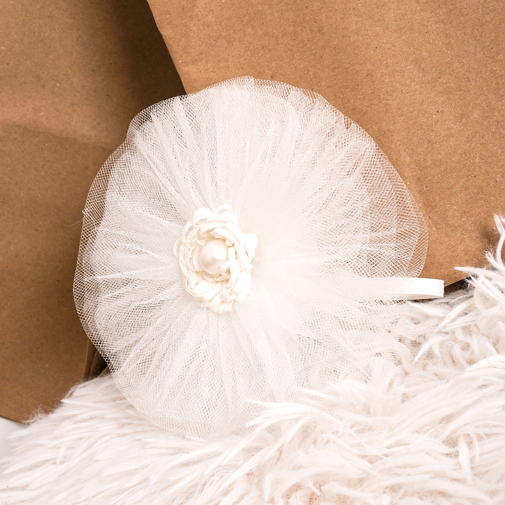 Pearl Rose white romper for babies, lightweight cotton outfit suitable for summer wear.