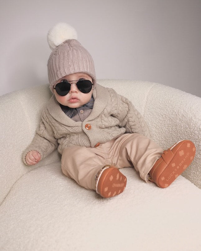 Organic cotton Tanner 3 piece knit baby clothing set, breathable unisex outfit for newborn comfort.