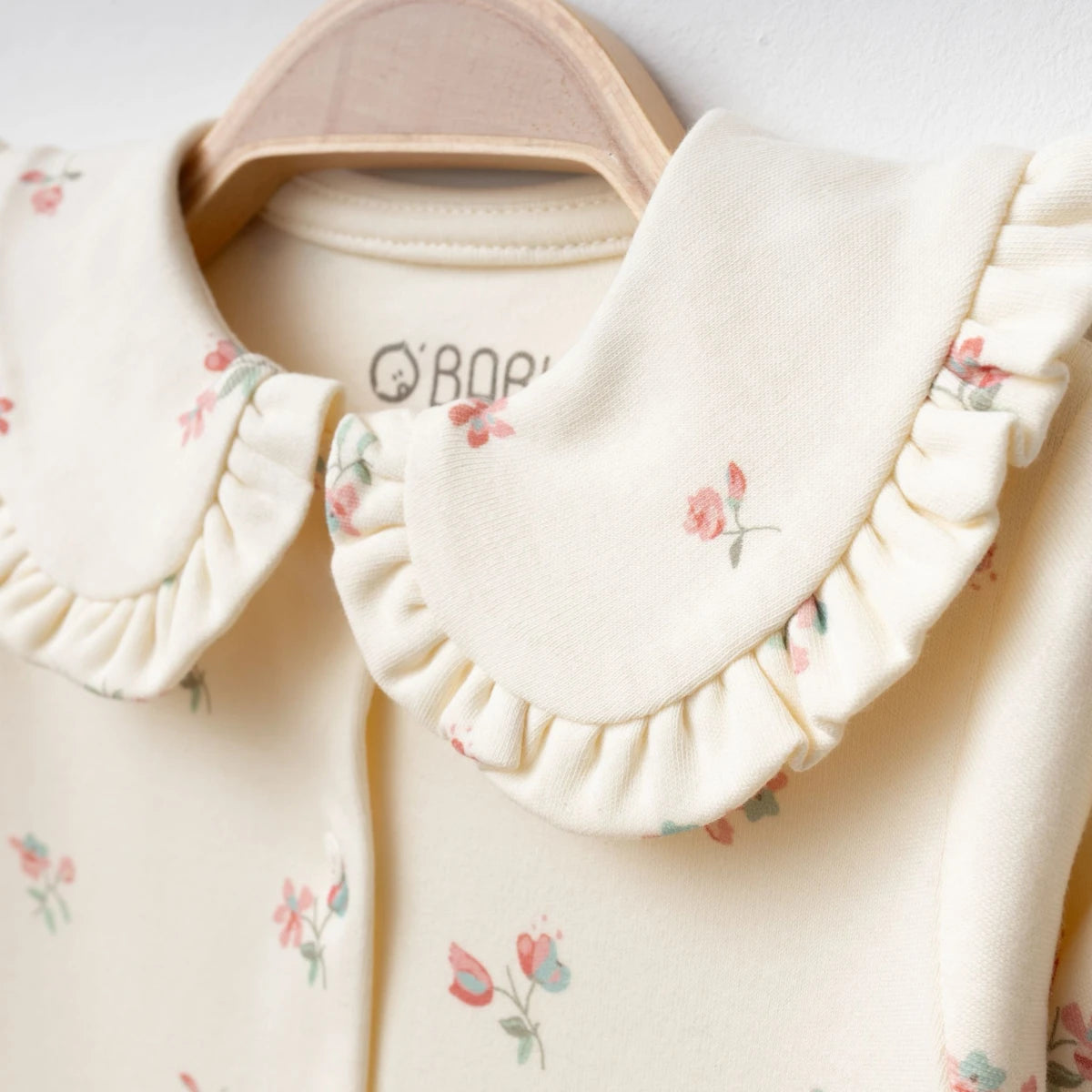 Ivory floral baby romper with matching headband