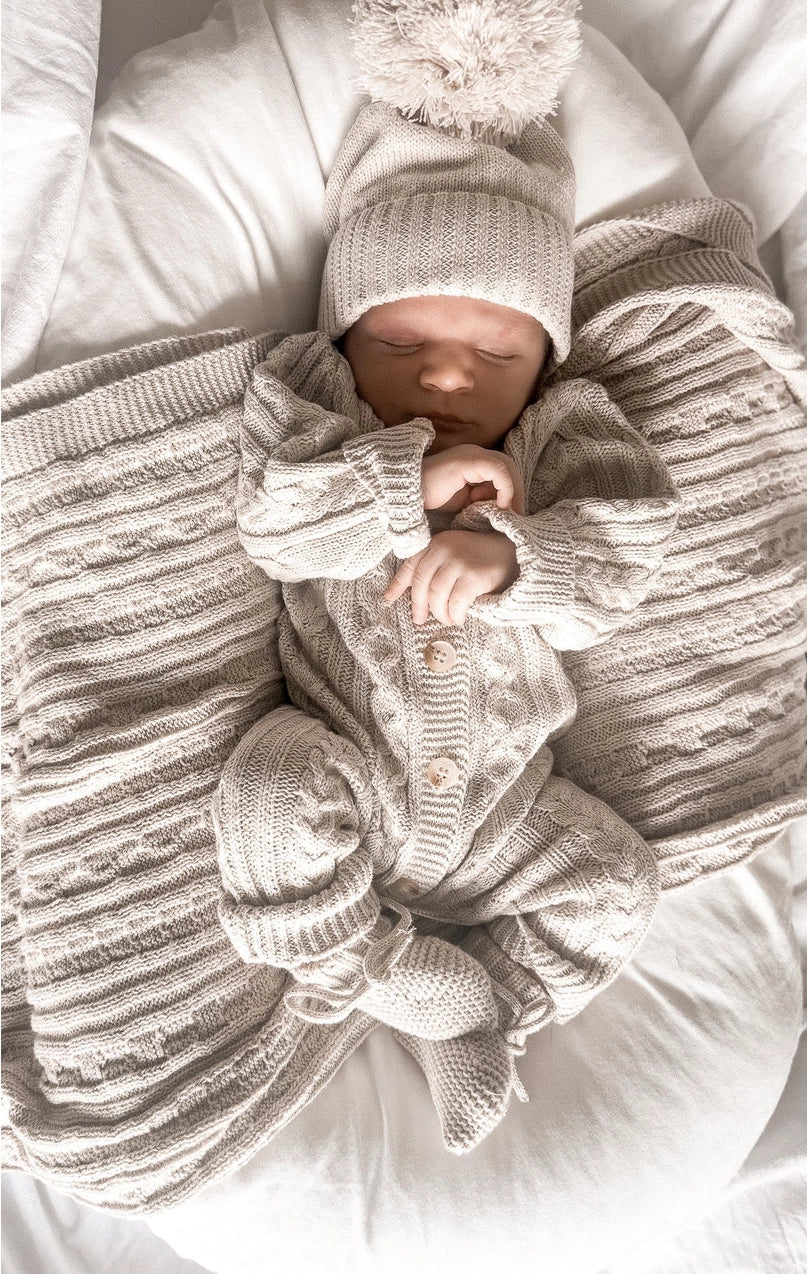 Beige baby jumpsuit