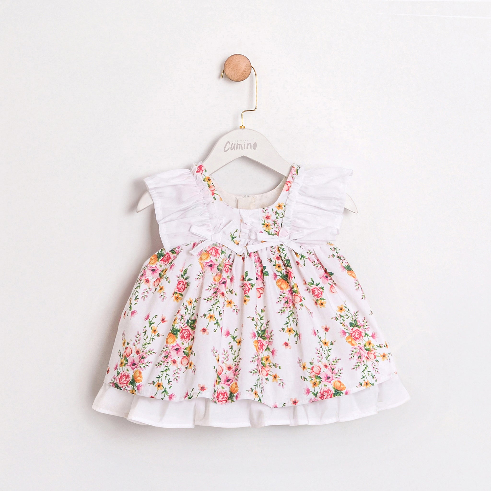Baby girl floral dress with white ruffle sleeves and bows