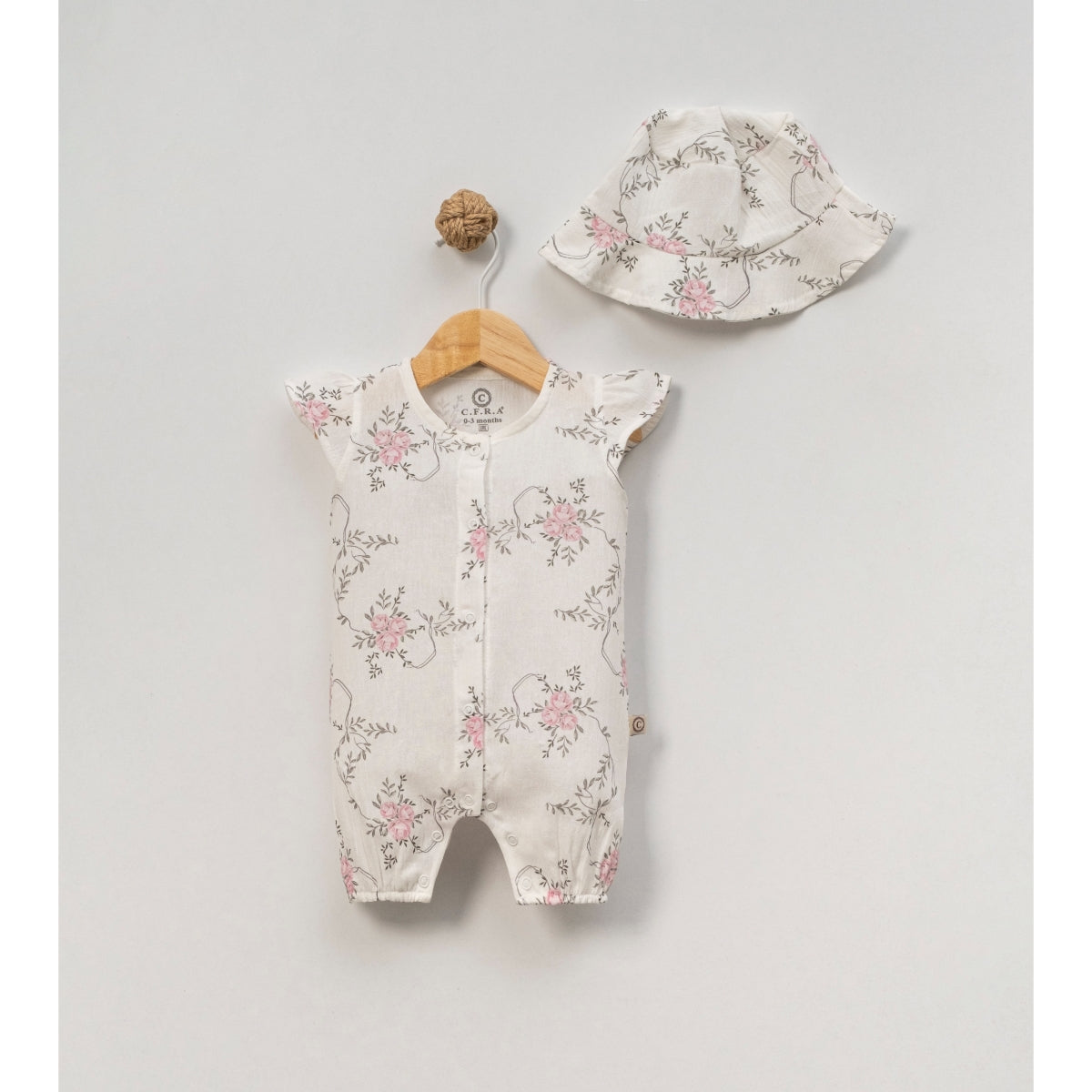 Cute baby girl outfit with floral print and hat