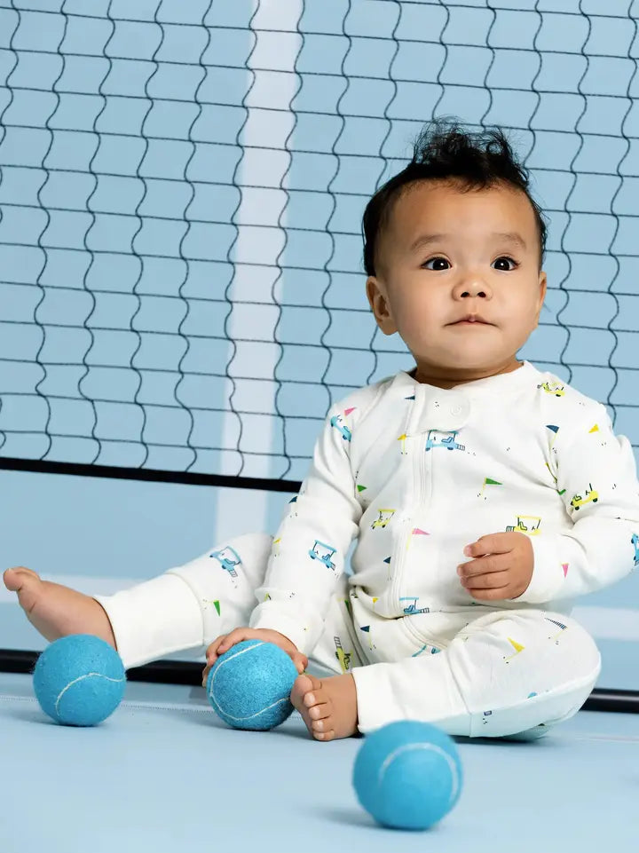 Infant golf-themed zip sleeper with playful golf flags and breathable cotton fabric