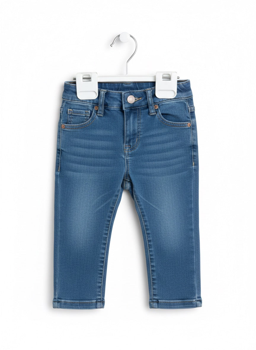 Cable knit vest baby outfit with plaid top and blue jeans