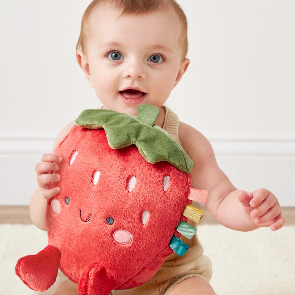 Soft strawberry baby plush toy with embroidered face