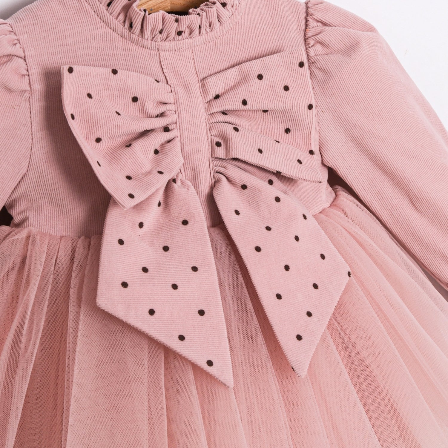 long sleeve baby dress with polka dot bow detail