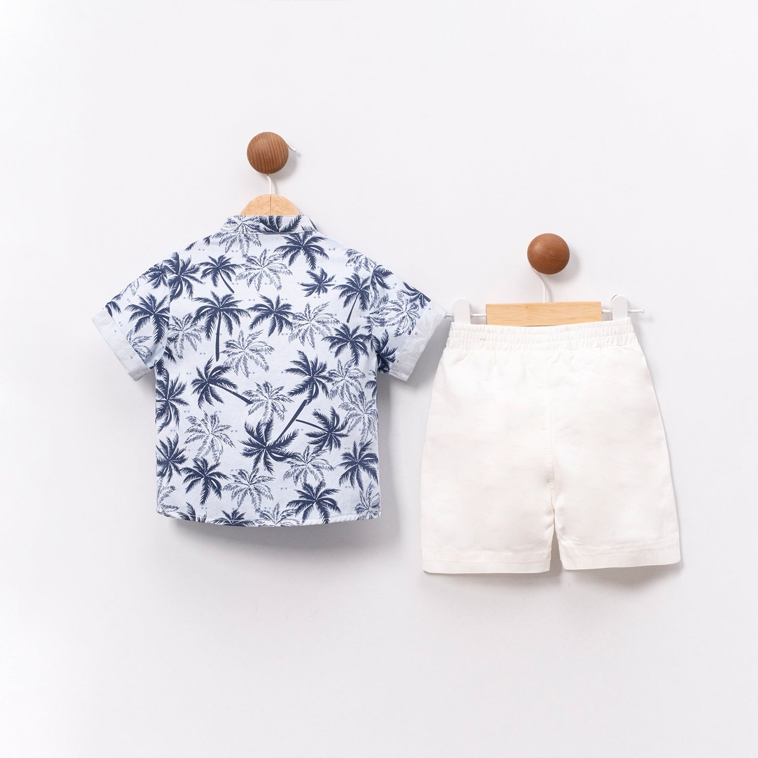 Stylish baby boy vacation outfit with palm print shirt