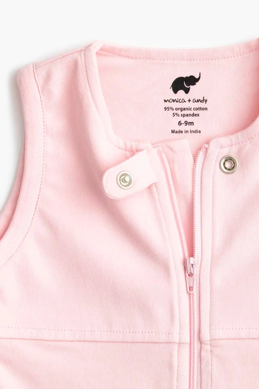 Soft blush pink wearable baby blanket made from organic cotton for safe sleep