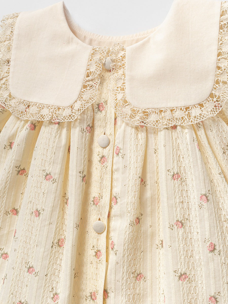 Floral baby dress with Peter Pan collar and lace trim