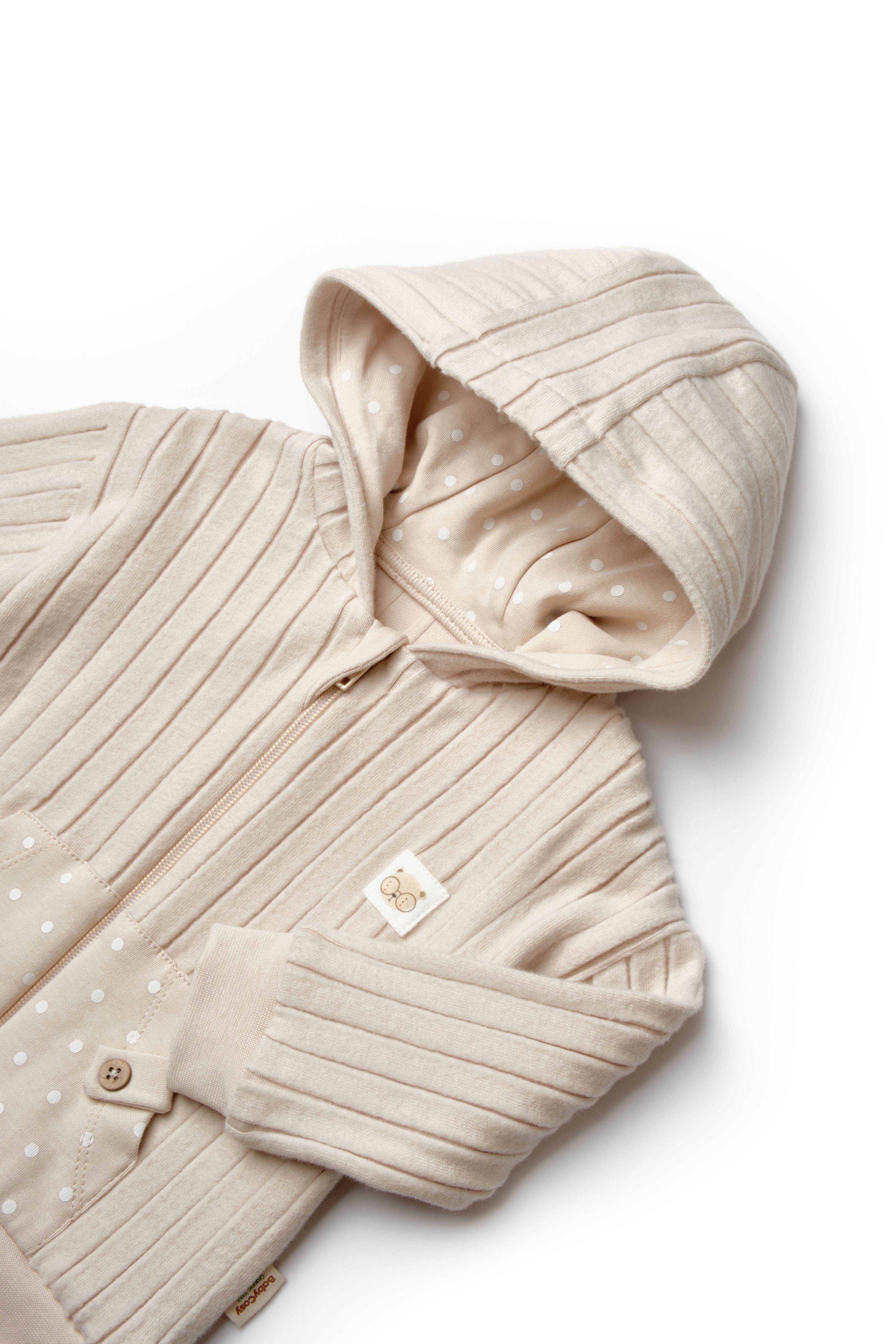 Cozy ribbed infant hoodie in cream and beige tones