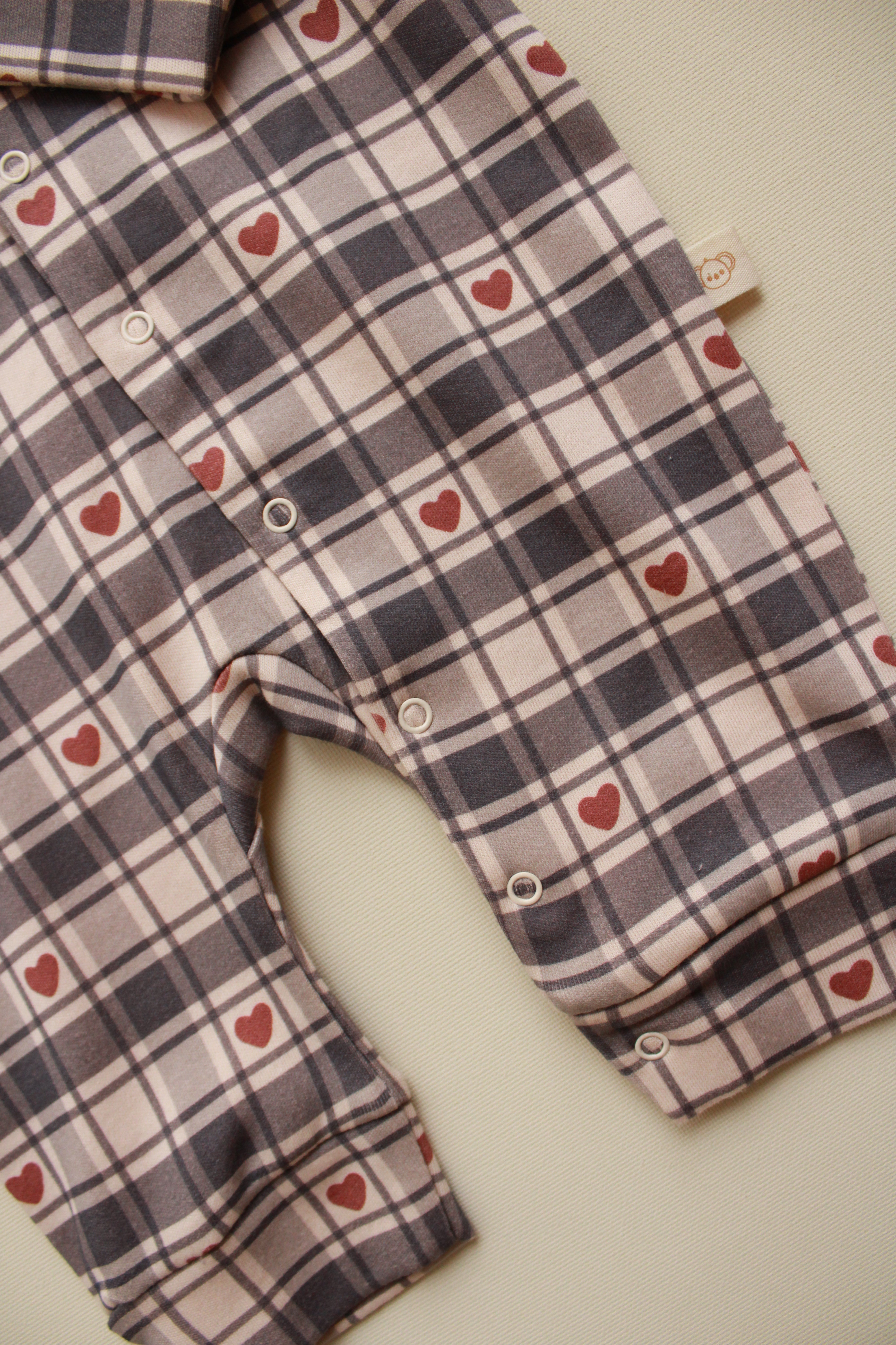 Heart plaid baby onesie by Honey and Hive