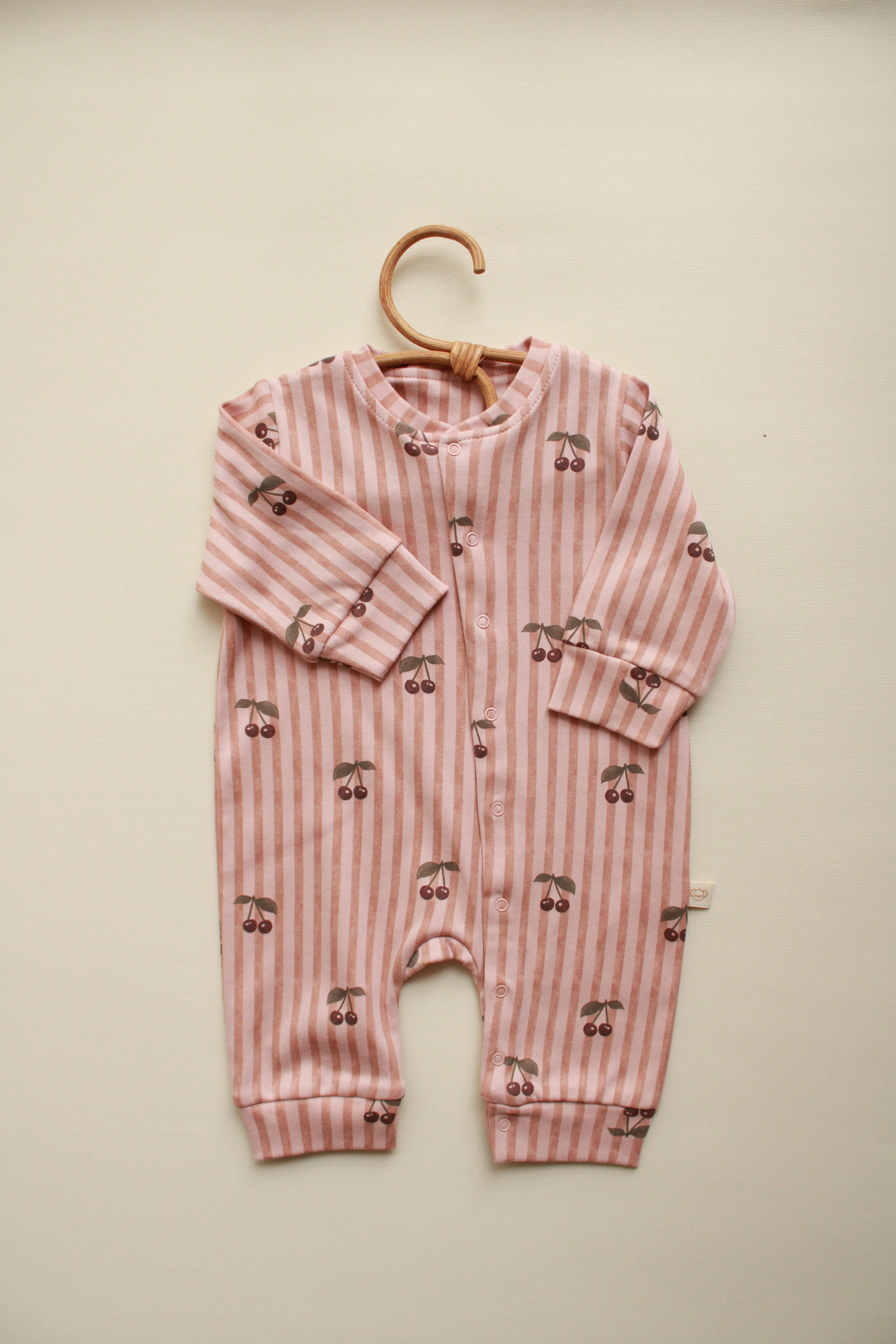 Cherry baby onesie with pink stripes and allover cherry print
