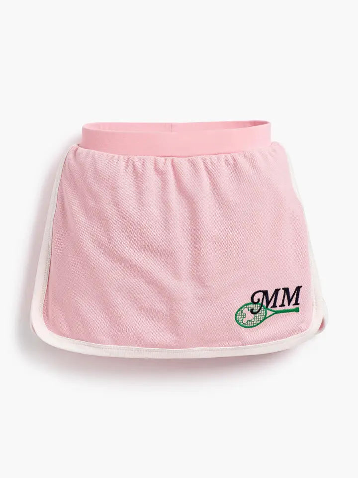Disney Minnie Mouse girls pink tennis skort with built-in shorts and embroidered tennis racket detail.